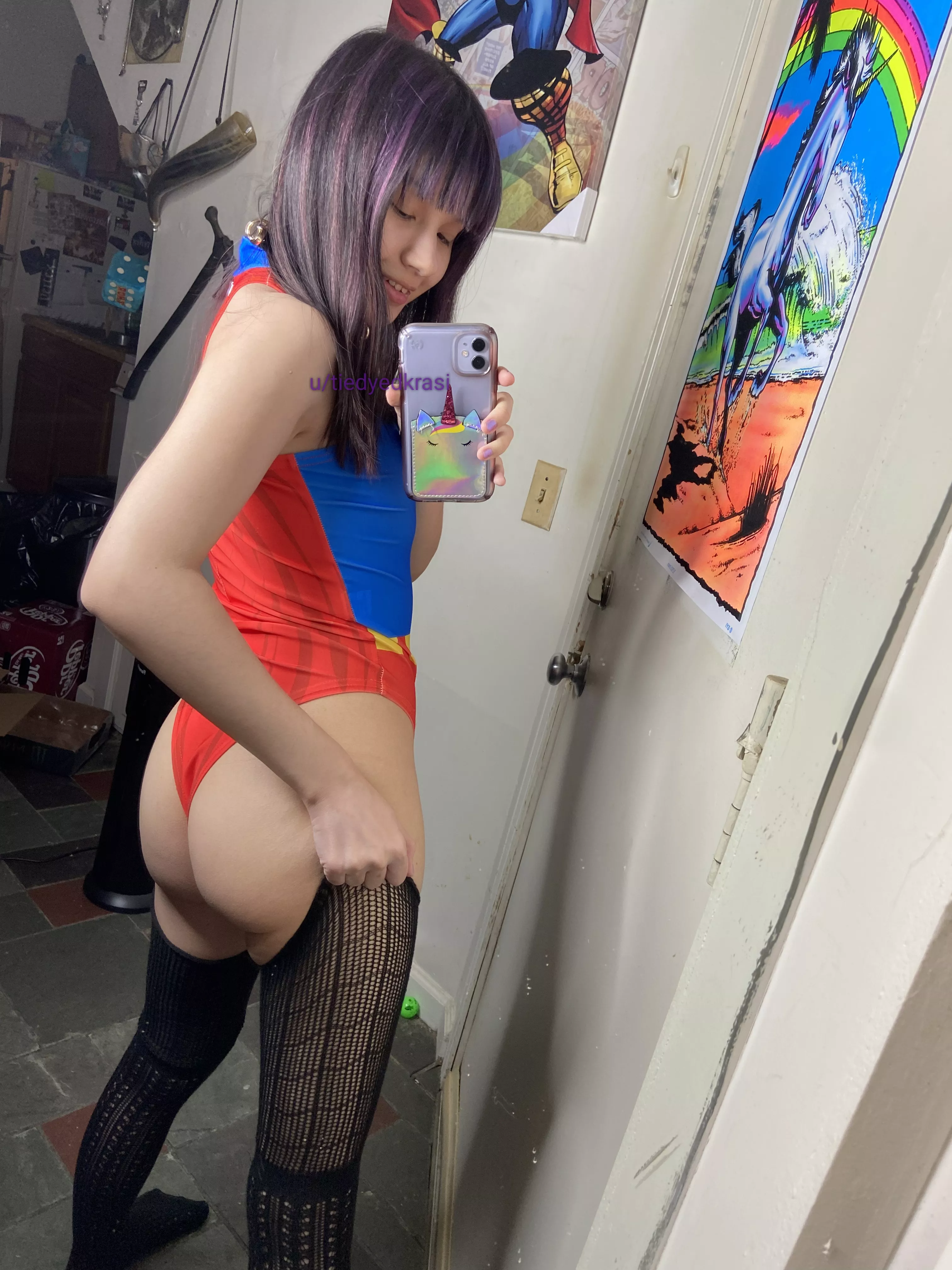 5ft 100lbs supergirl with the cakes in the back