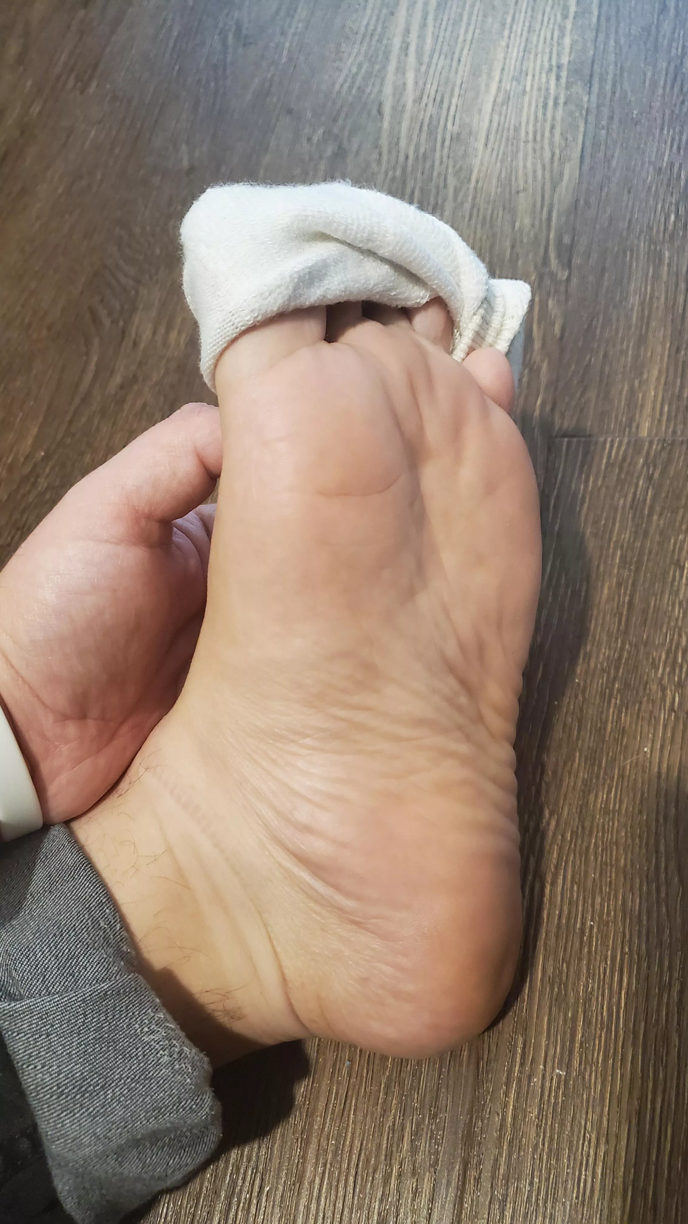 peeling off my sweaty sock