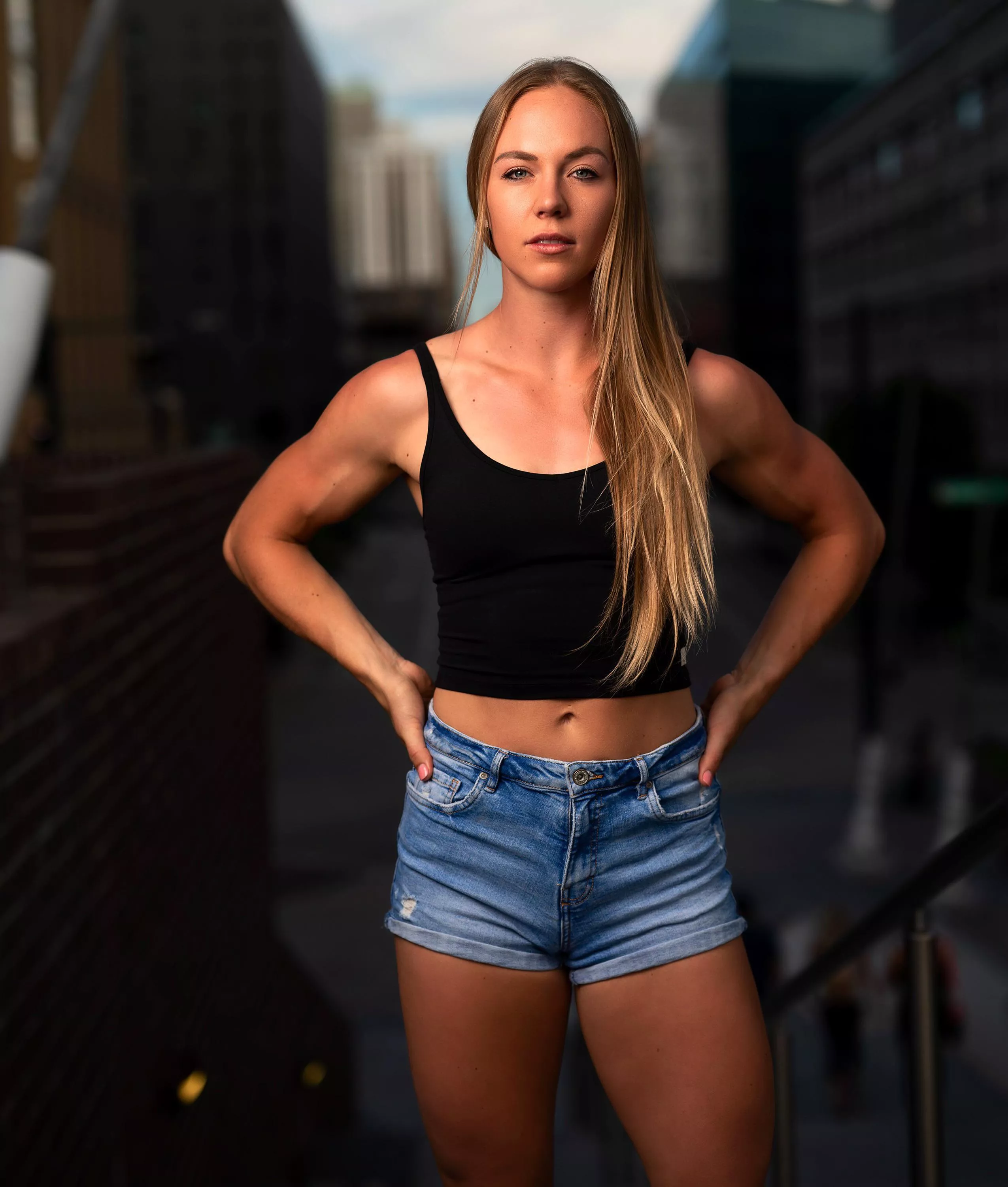 Black top, cutoff shorts, and muscles (natalie)