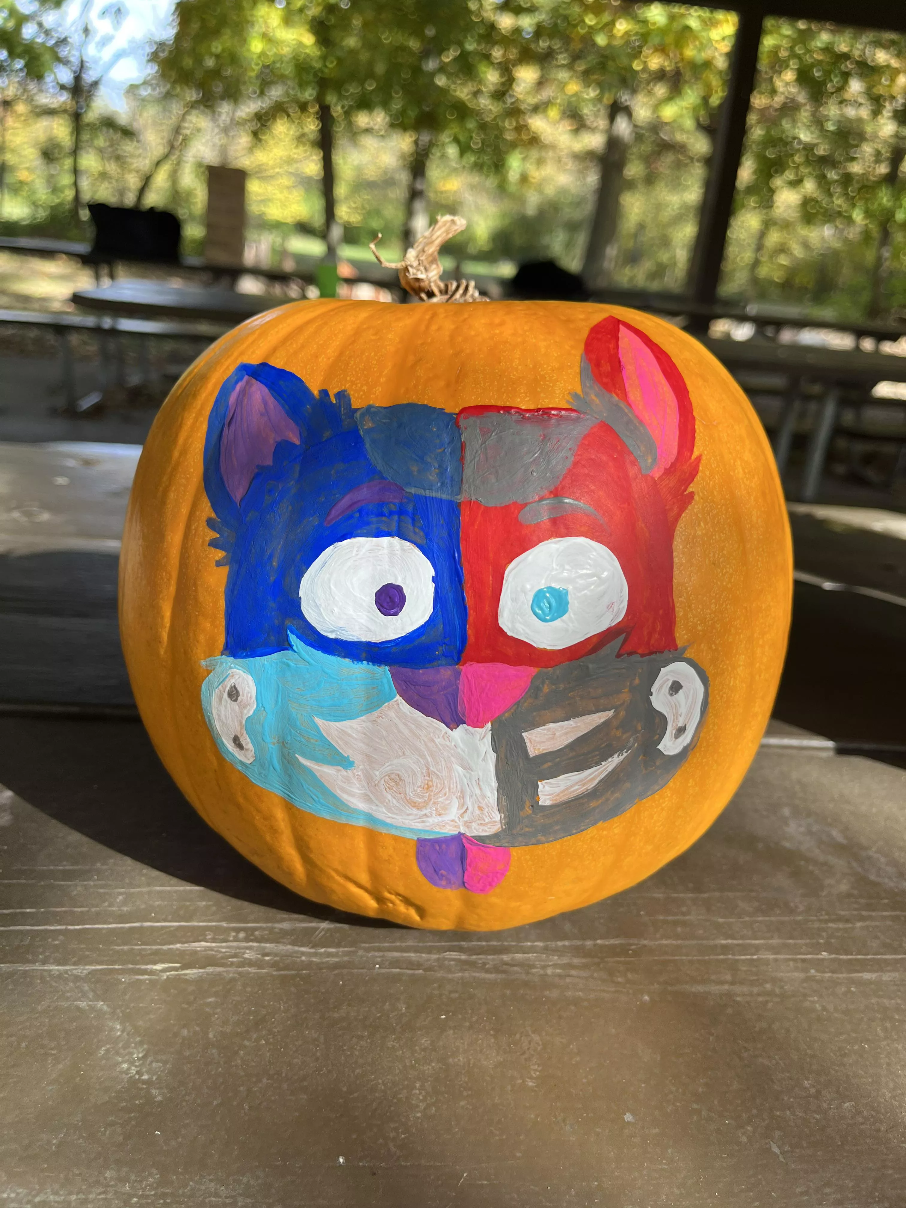 Pup Berry decided to paint berry and rocket on a pumpkin yesterday!