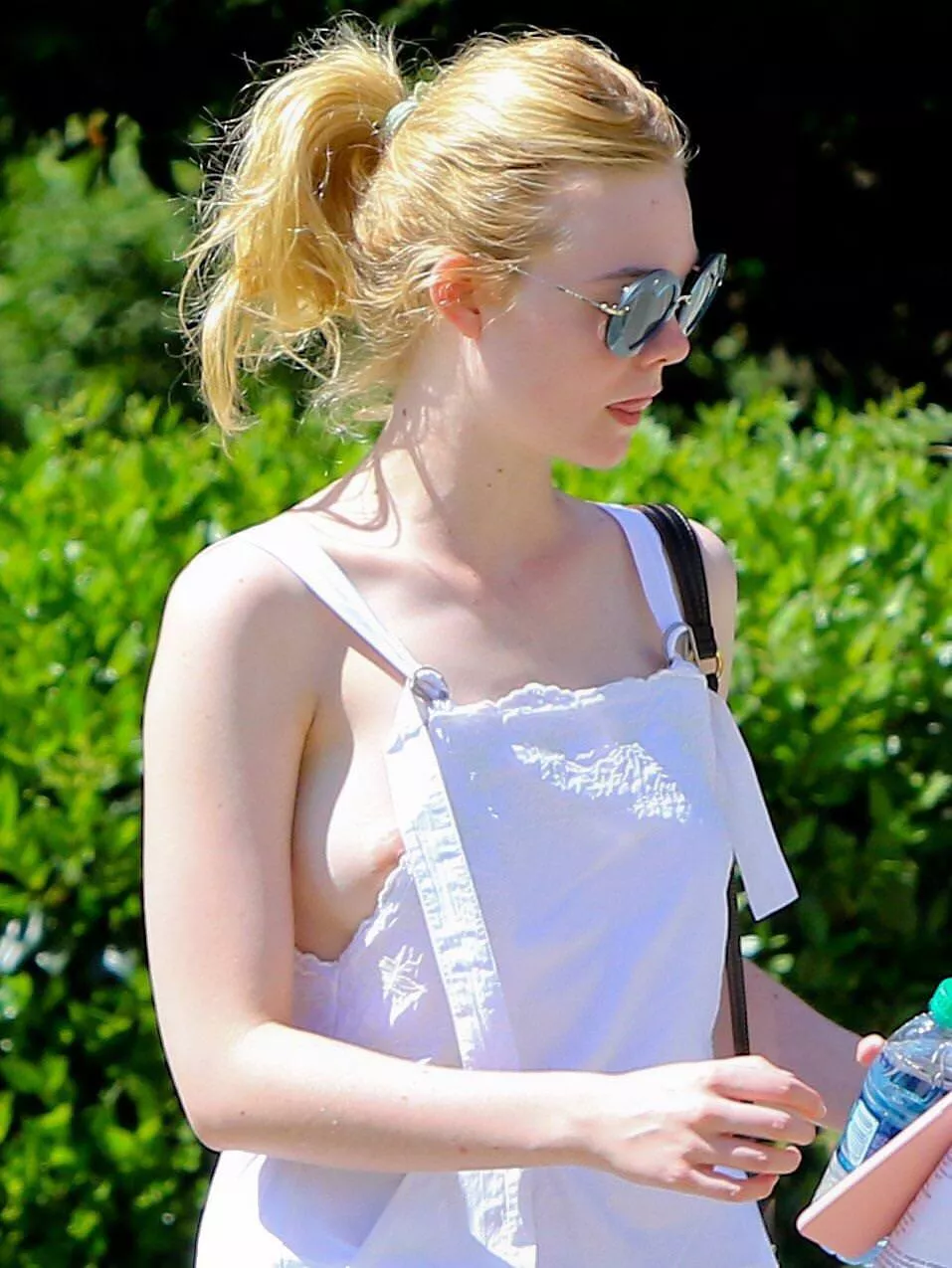 Elle Fanning showing us some nipple.