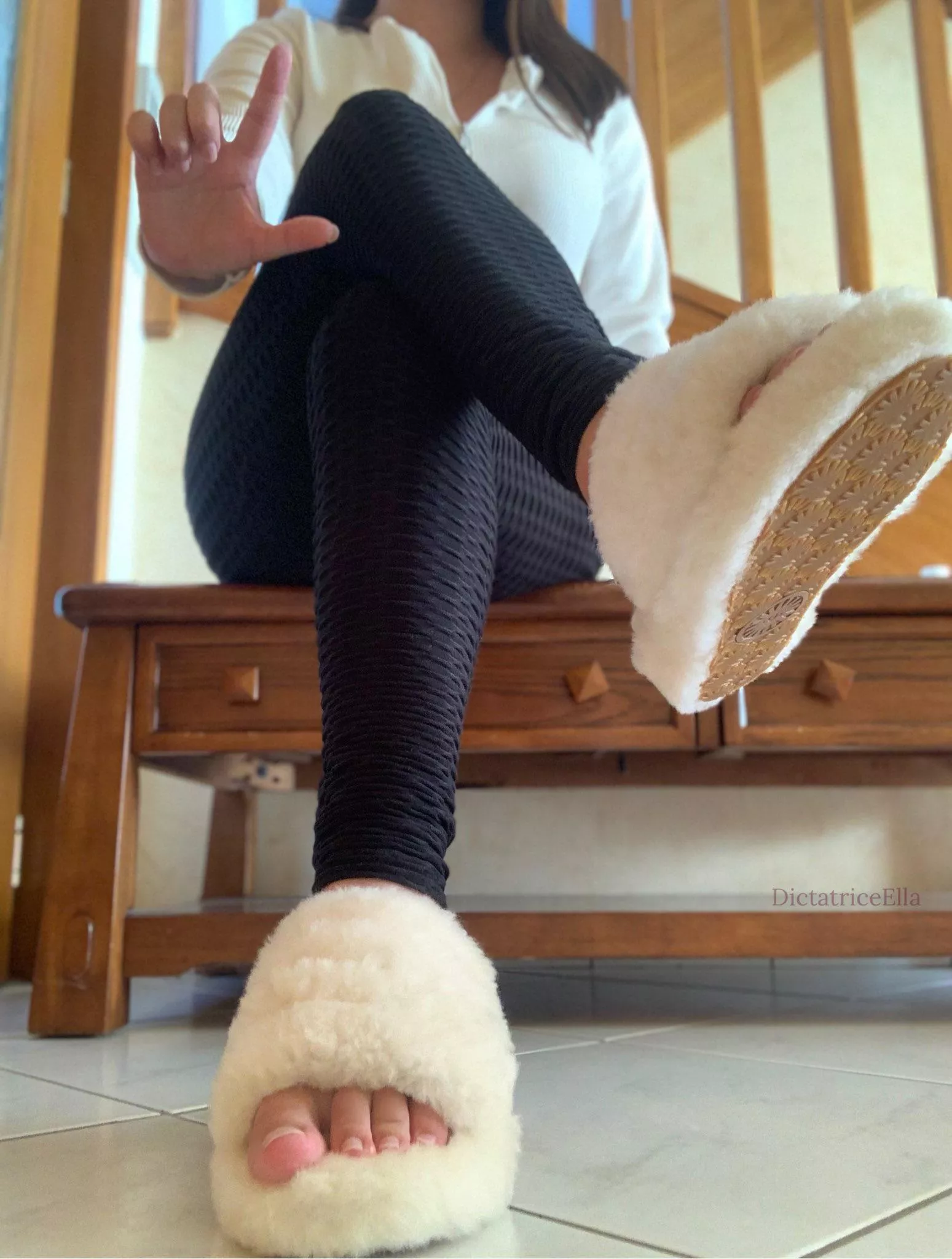 Feet in fluffy slippers are your trigger.