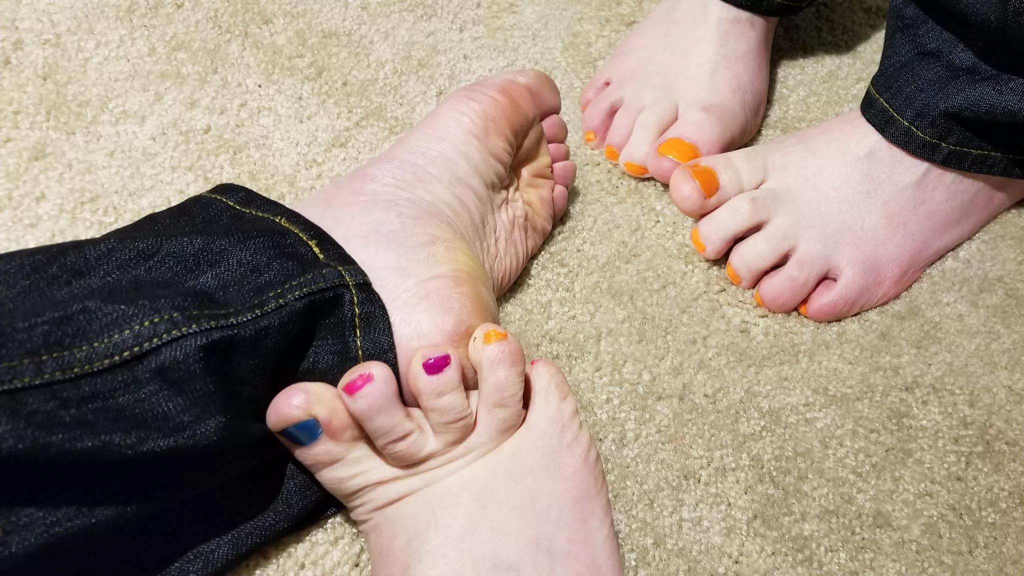 Which pair of feet would you like to have your balls squashed between?