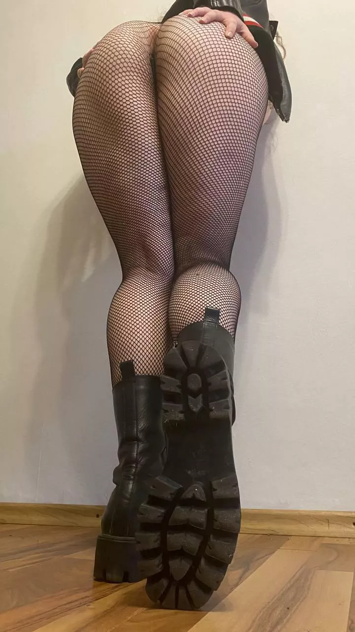 Boots, fishnets and sexy ass are the best combo