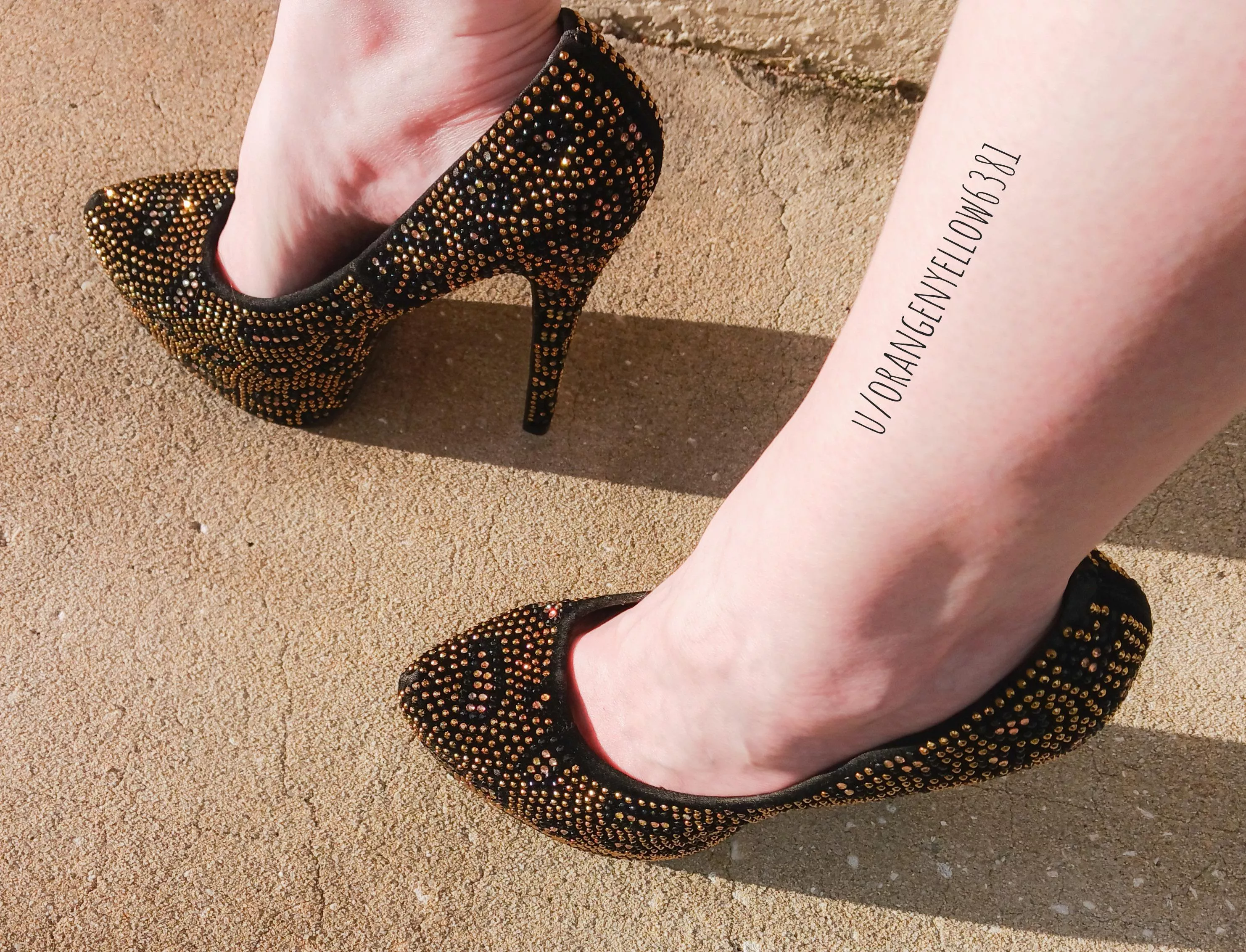 Gold and black rhinestone heels