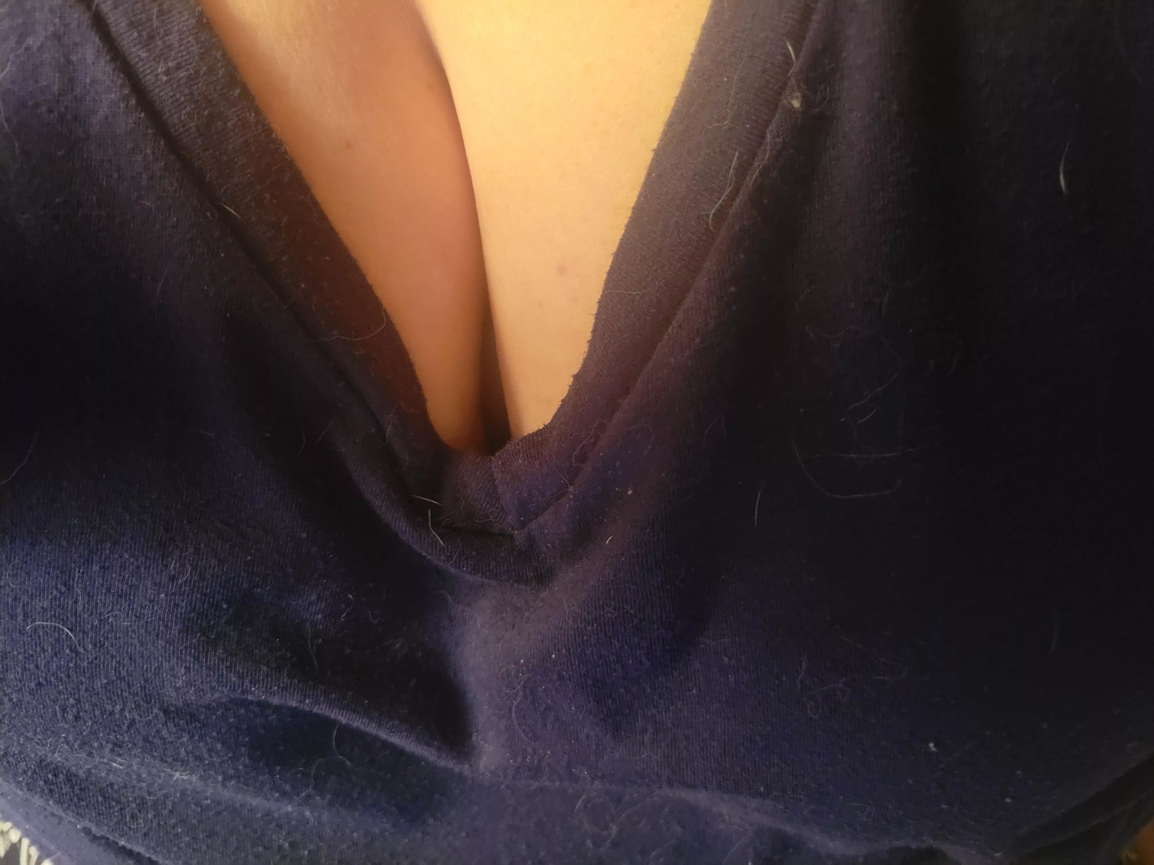 A peek down my sweaty, post-workout t-shirt.