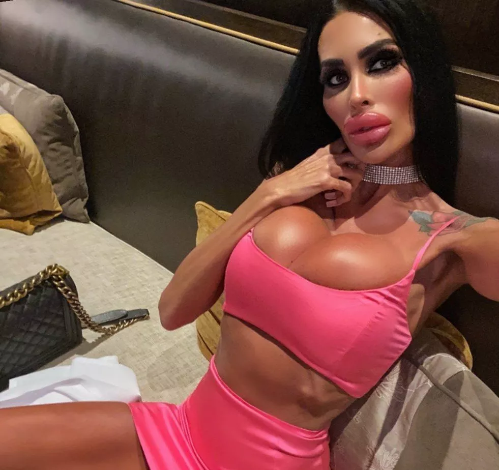 Skinny bimbo fully enhanced