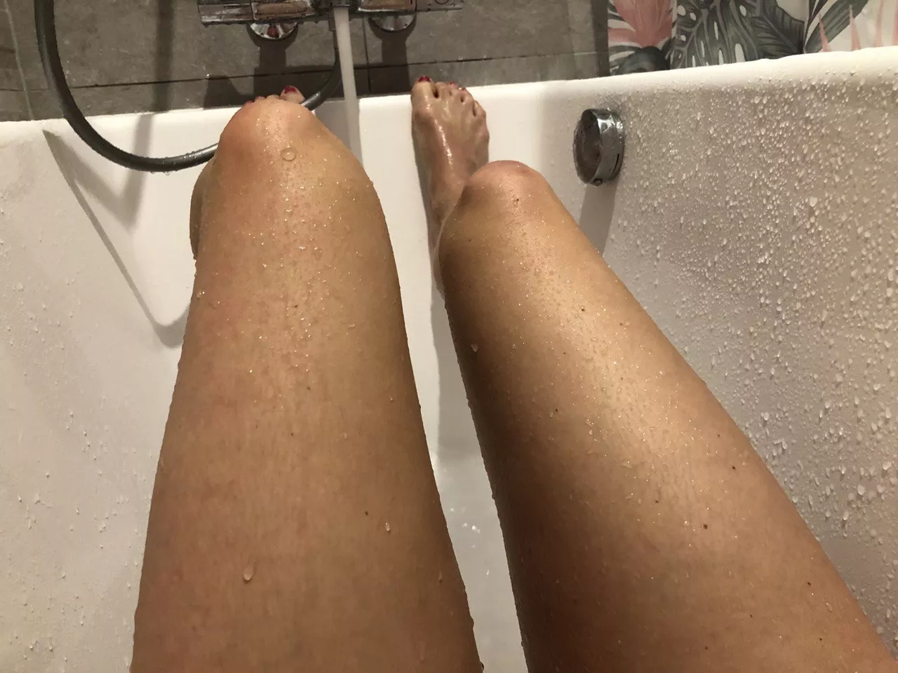 Just finished my shower time and showing you my beautiful legs in lying in bath