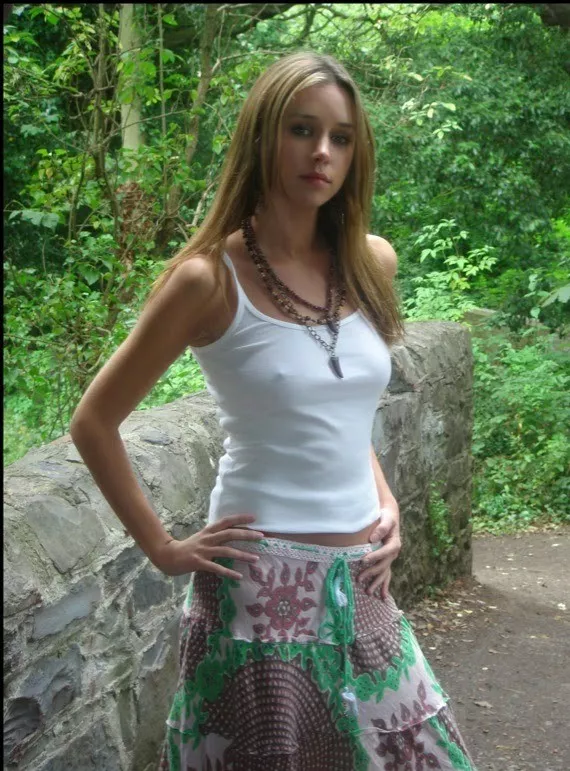 Nice skirt with tank-top showing pokies