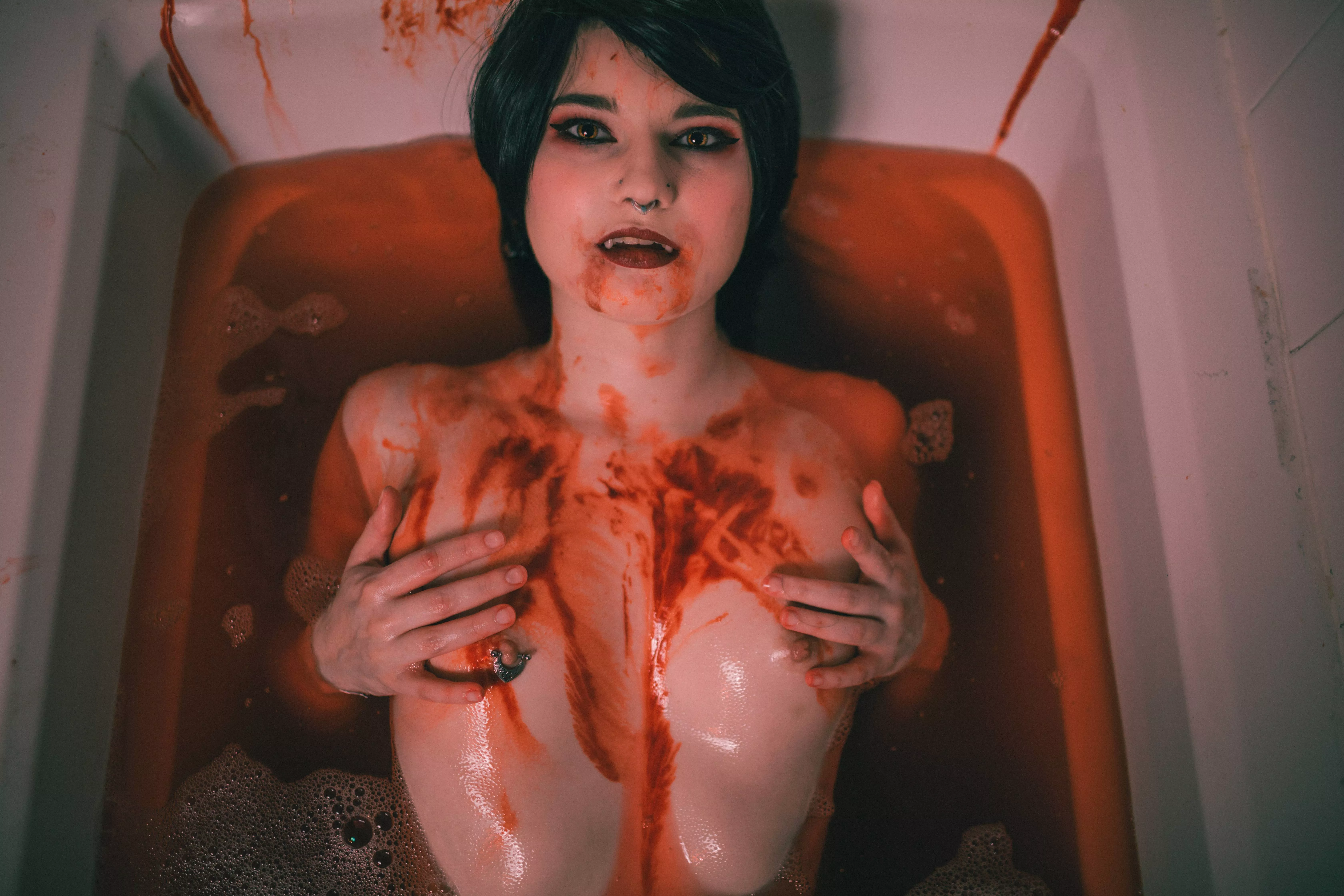 Following the trail of blood throughout the dungeon, you entire the vampiress' personal quarters and find them cleansing themselves after their latest kill. Roll for initiative! [F]