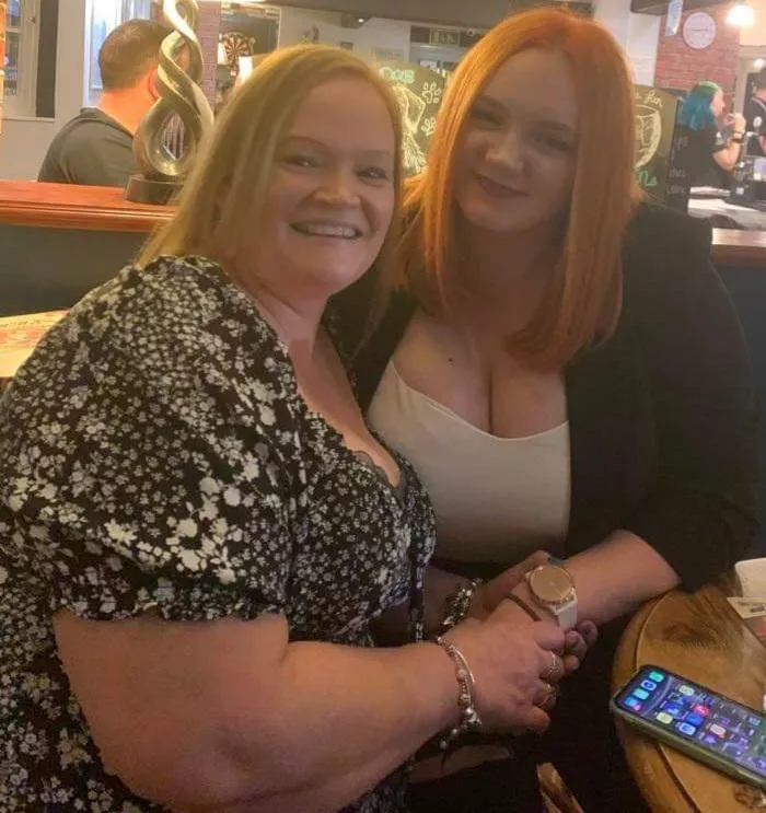 A busty pair of mother left daughter right