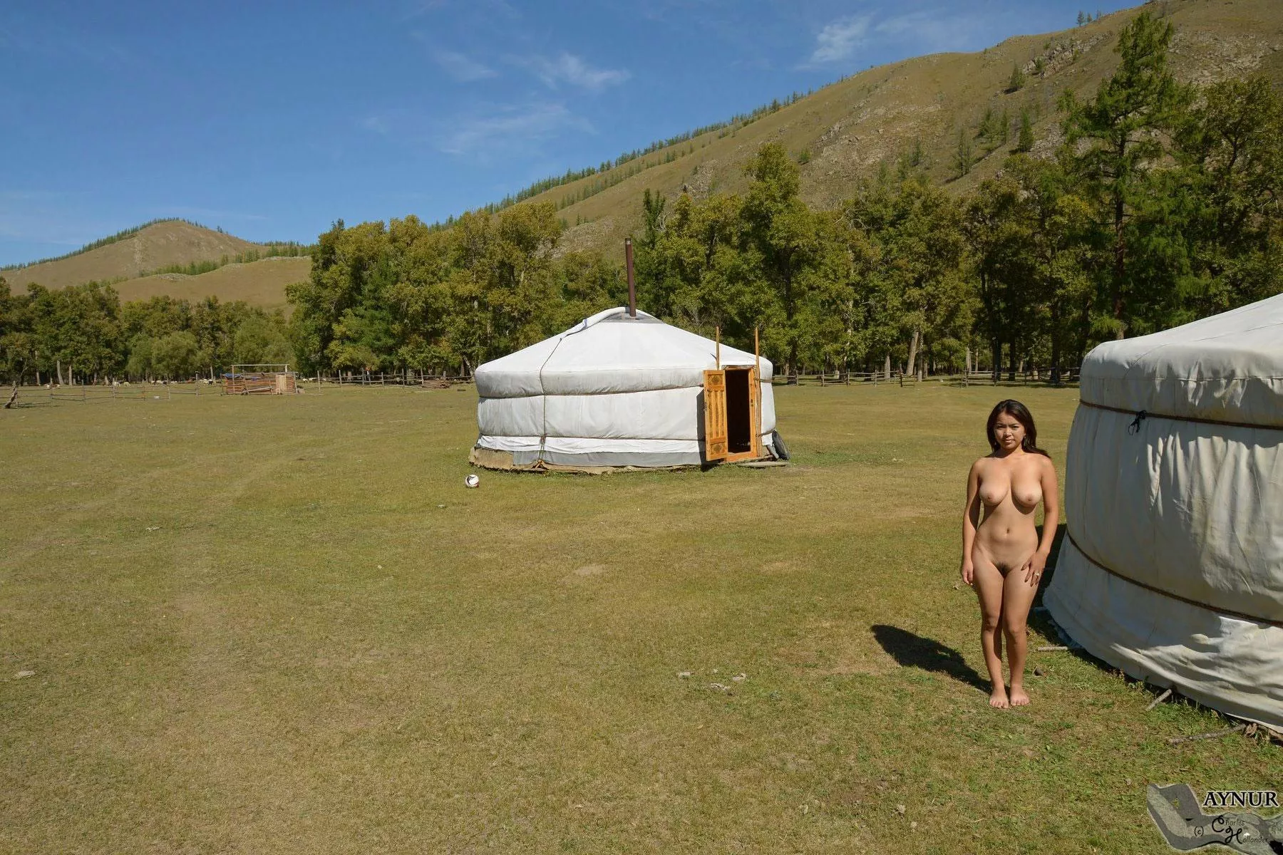 Aynur nude. In front of her Mongolian yurt.