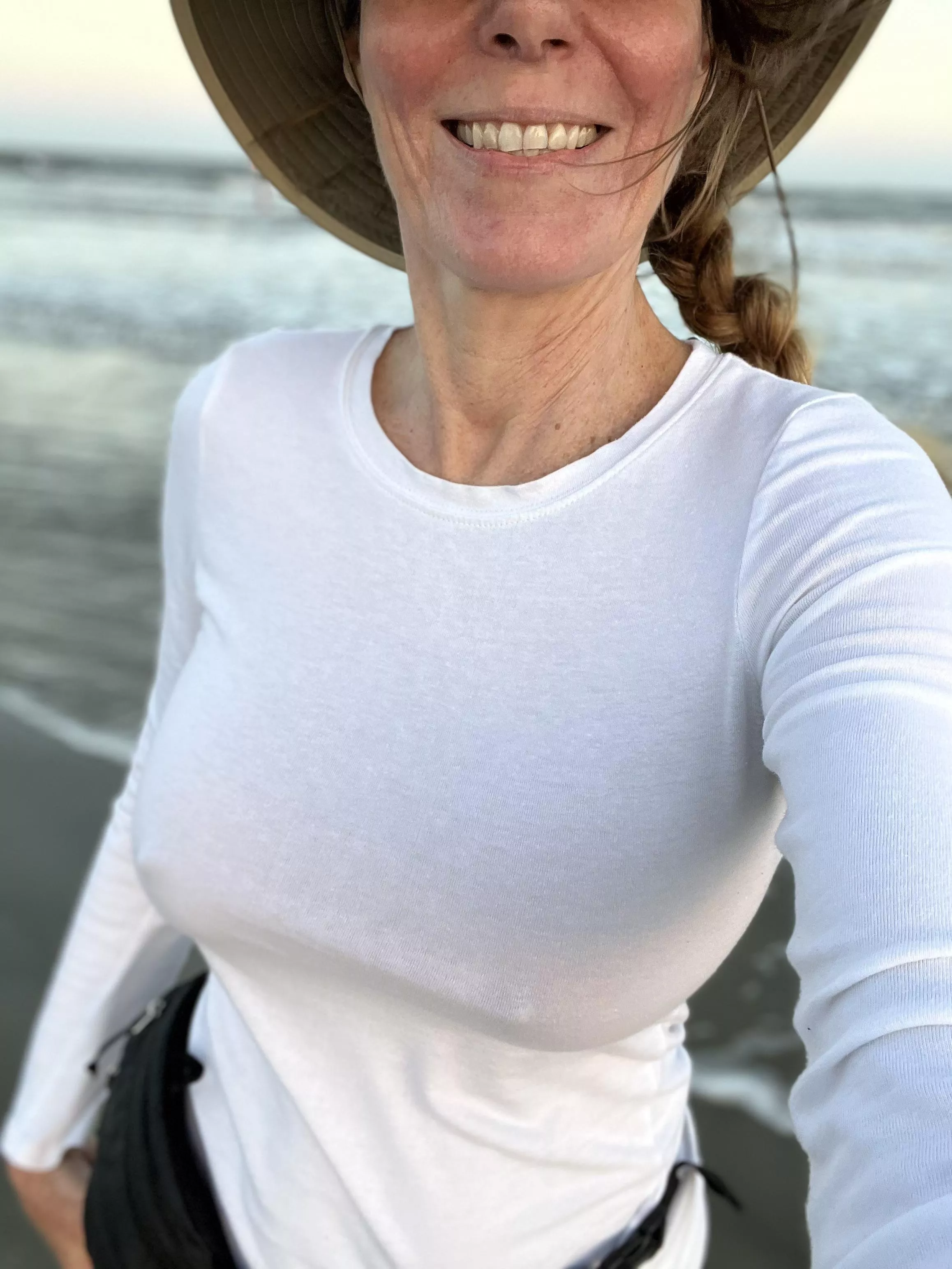 Braless babe at the beach.