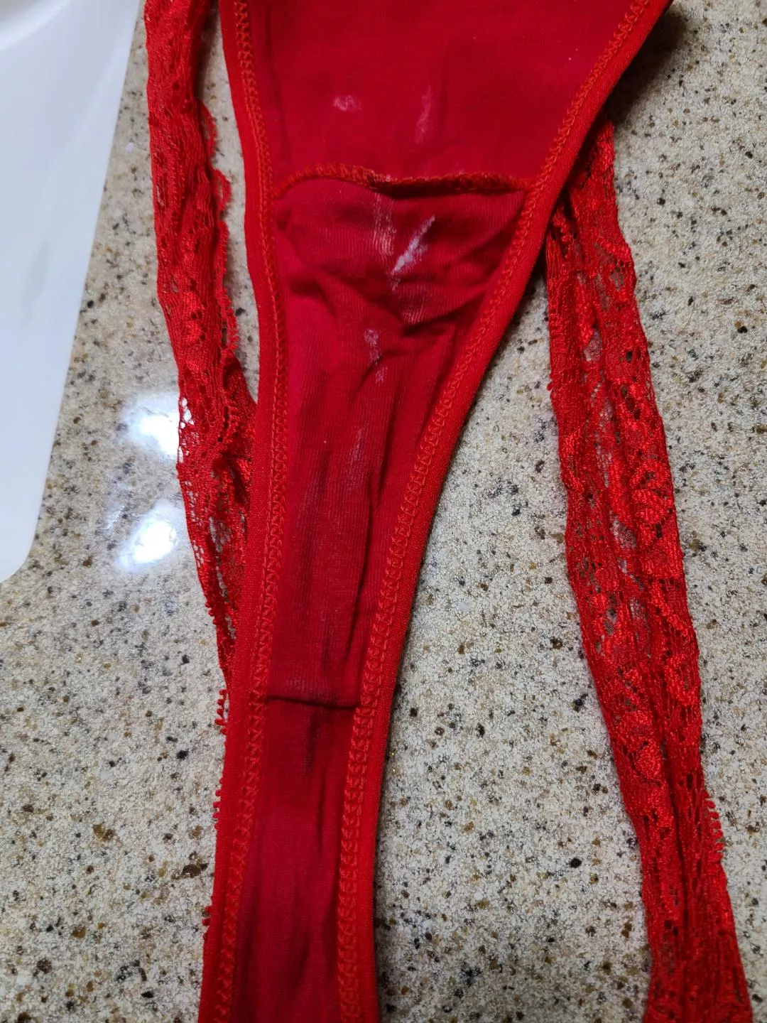 Bright red thong, with cum and pee :)