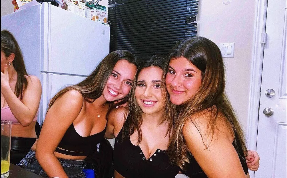 Brunettes In Black Tops