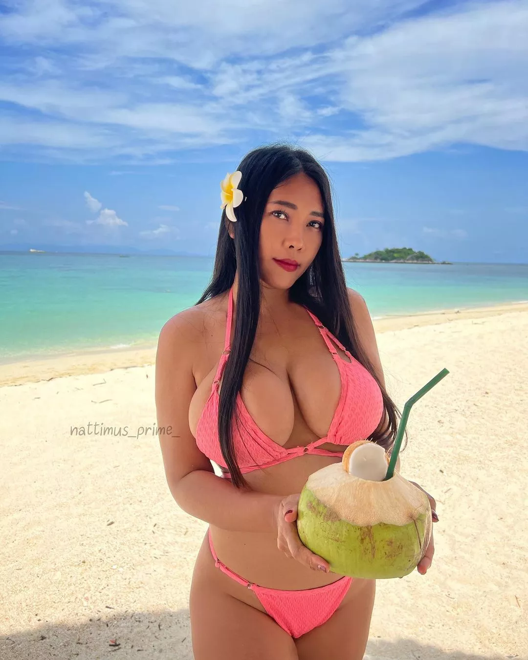 Busty babe on the beach