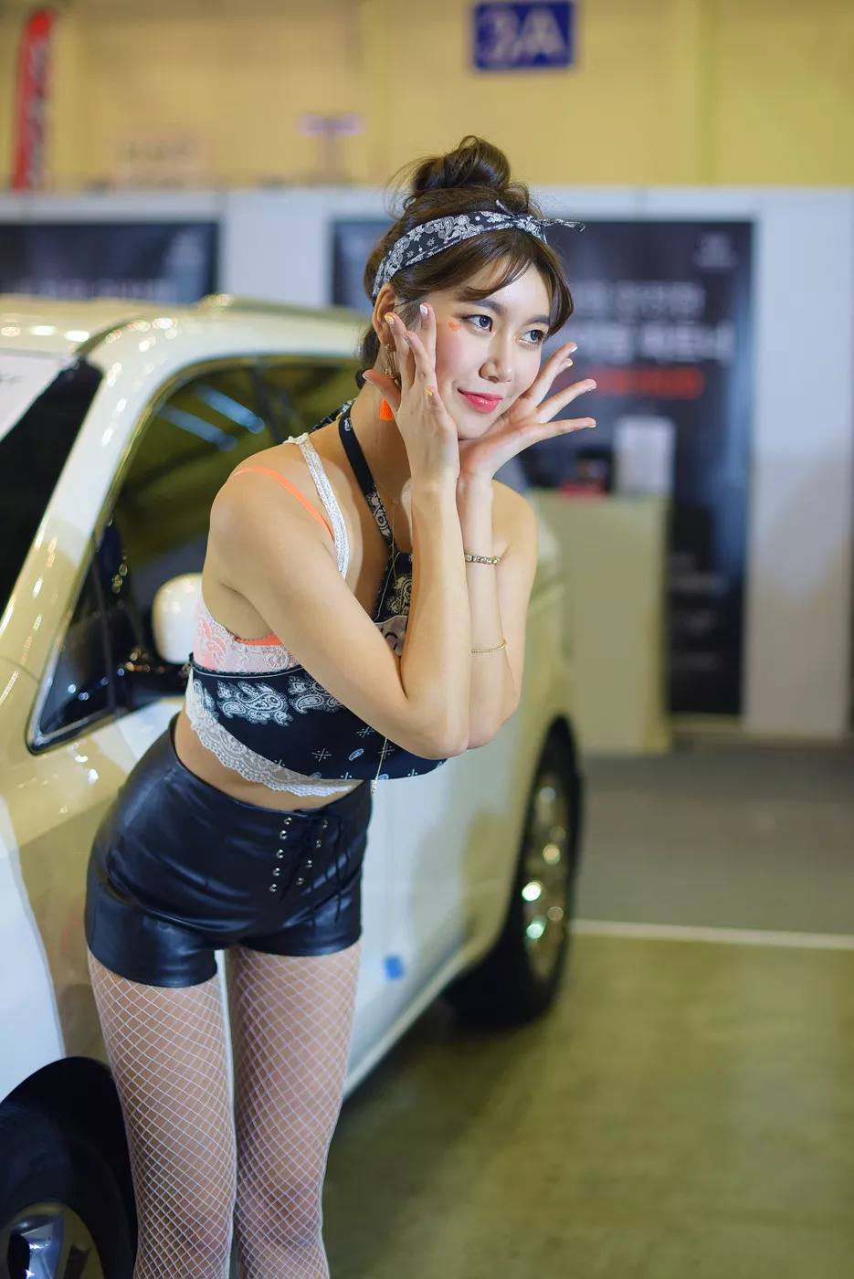 Car show girl in white fishnets