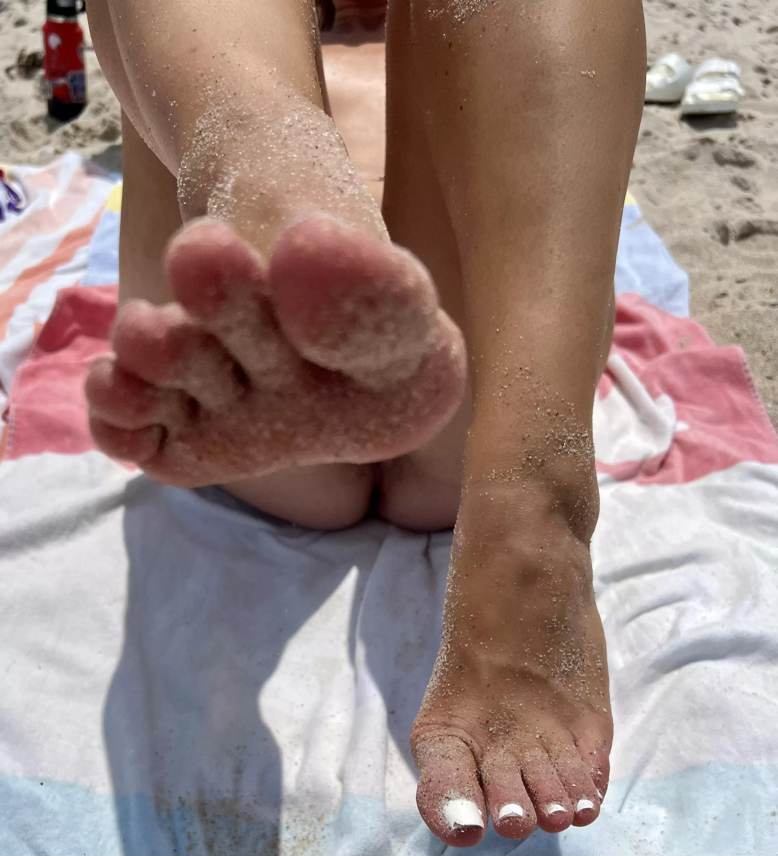 Chasing the ocean with her perfect toes