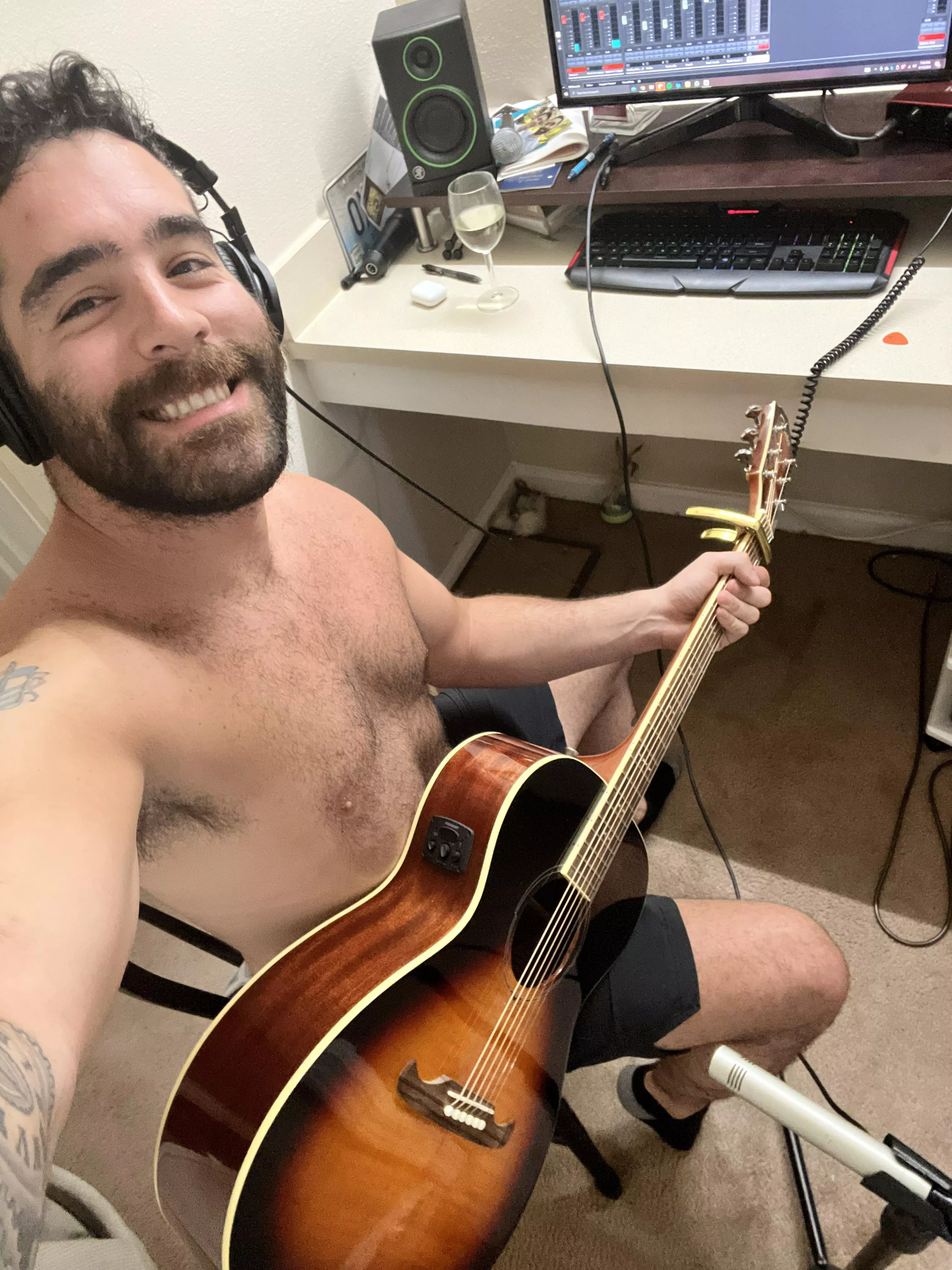 Chest hair and guitar!