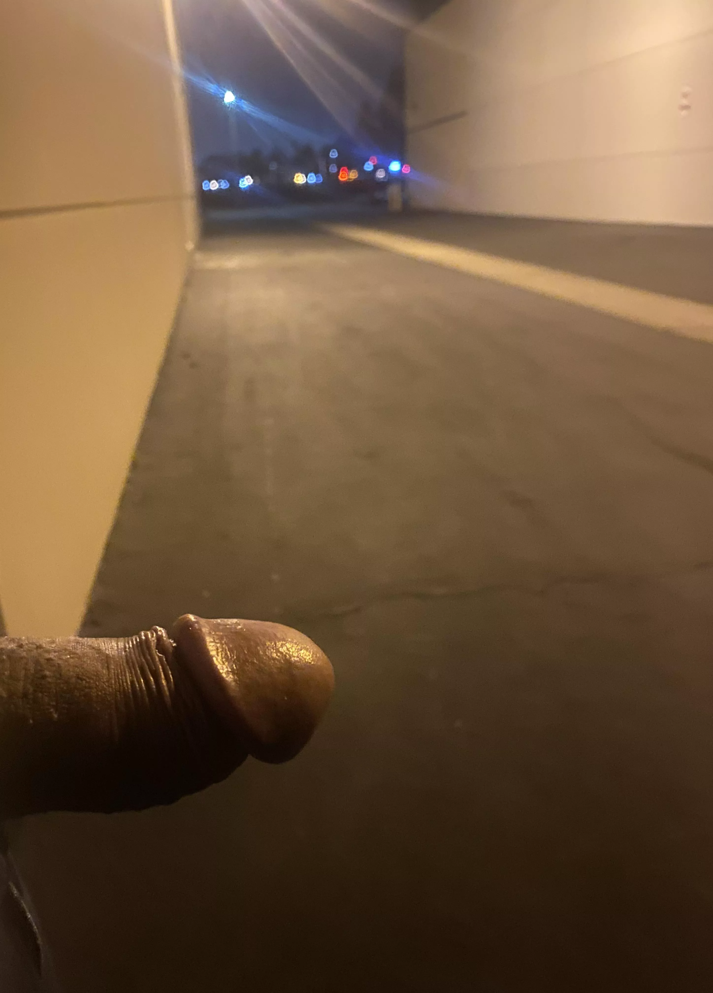 Cock out between buildings.