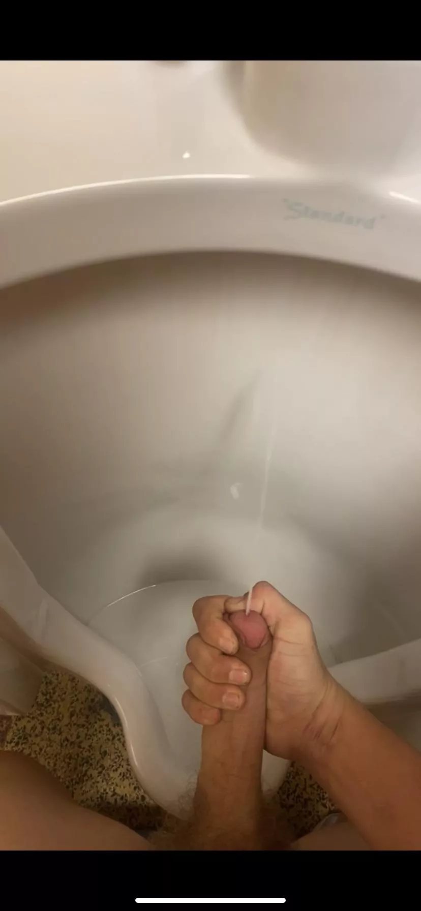 Cum in a public urinal