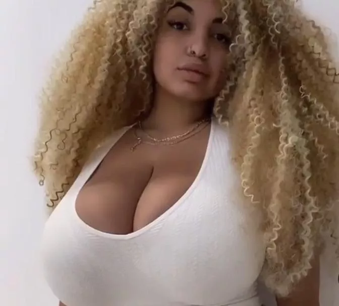 Curly busty