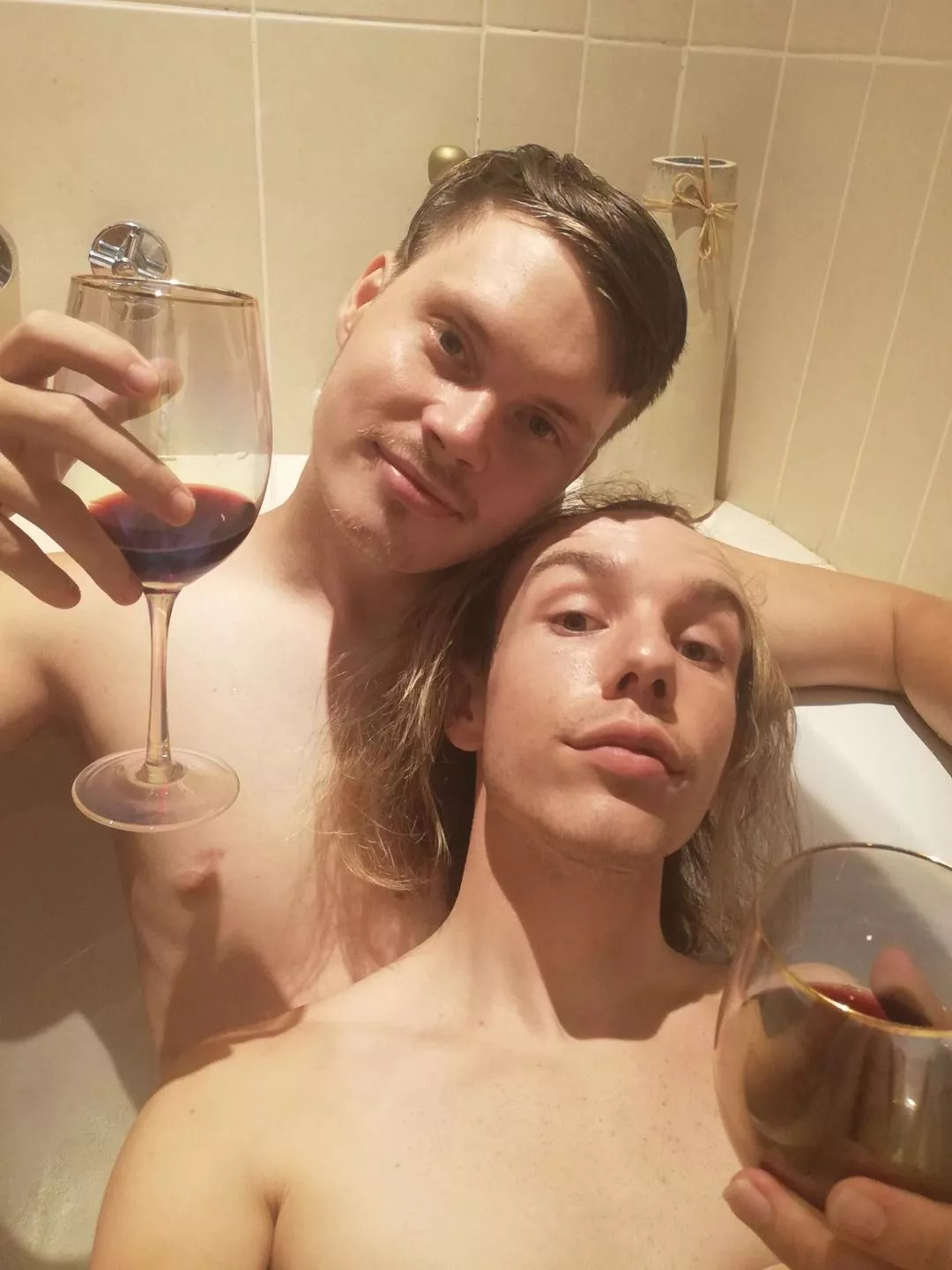 cute boyfriends in a bath with wine, as gay as it gets