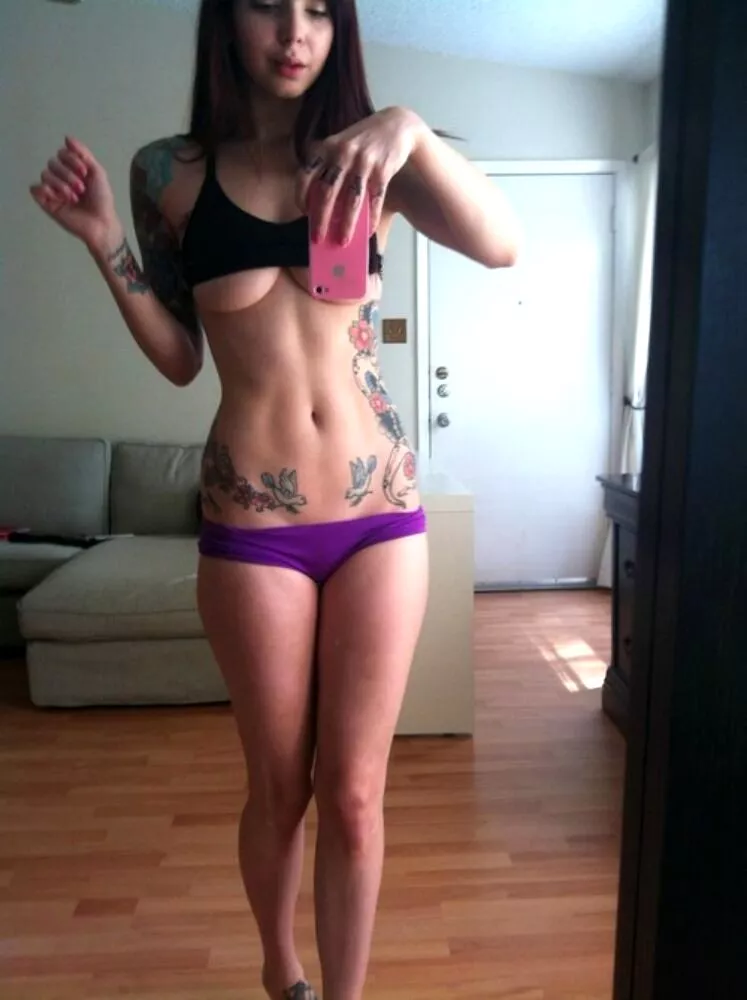 Cute tattooed teen