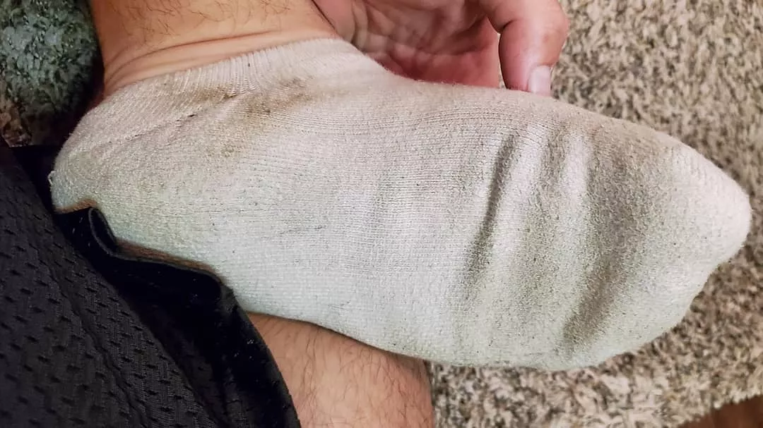 Damp, sweat-stained 2-week old socks on my feet