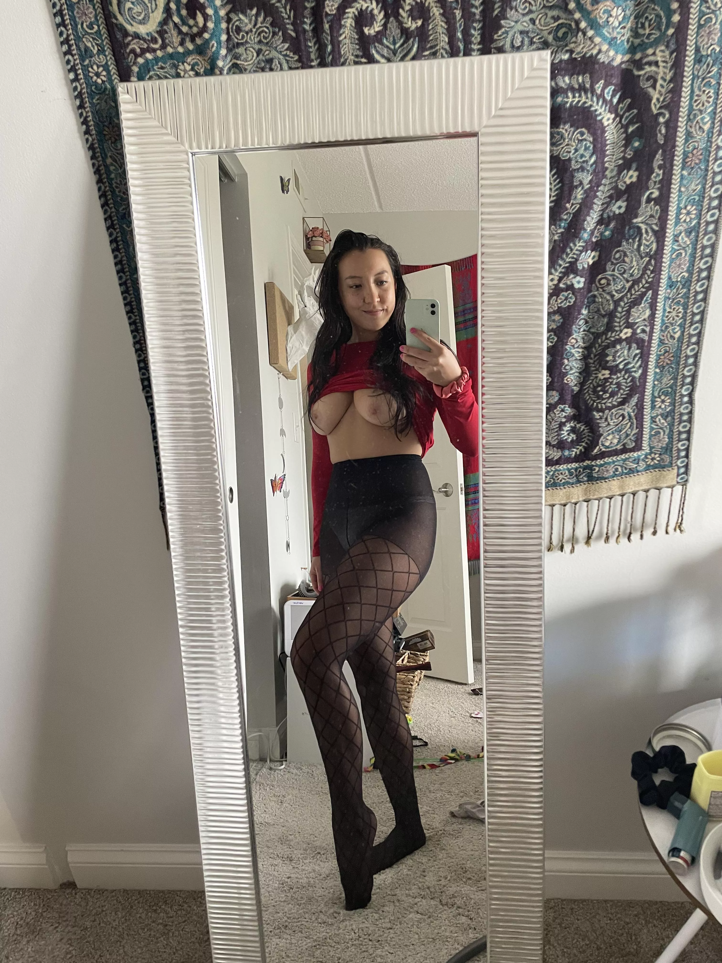 Do you like how my tits hang out while I wear panty hose?