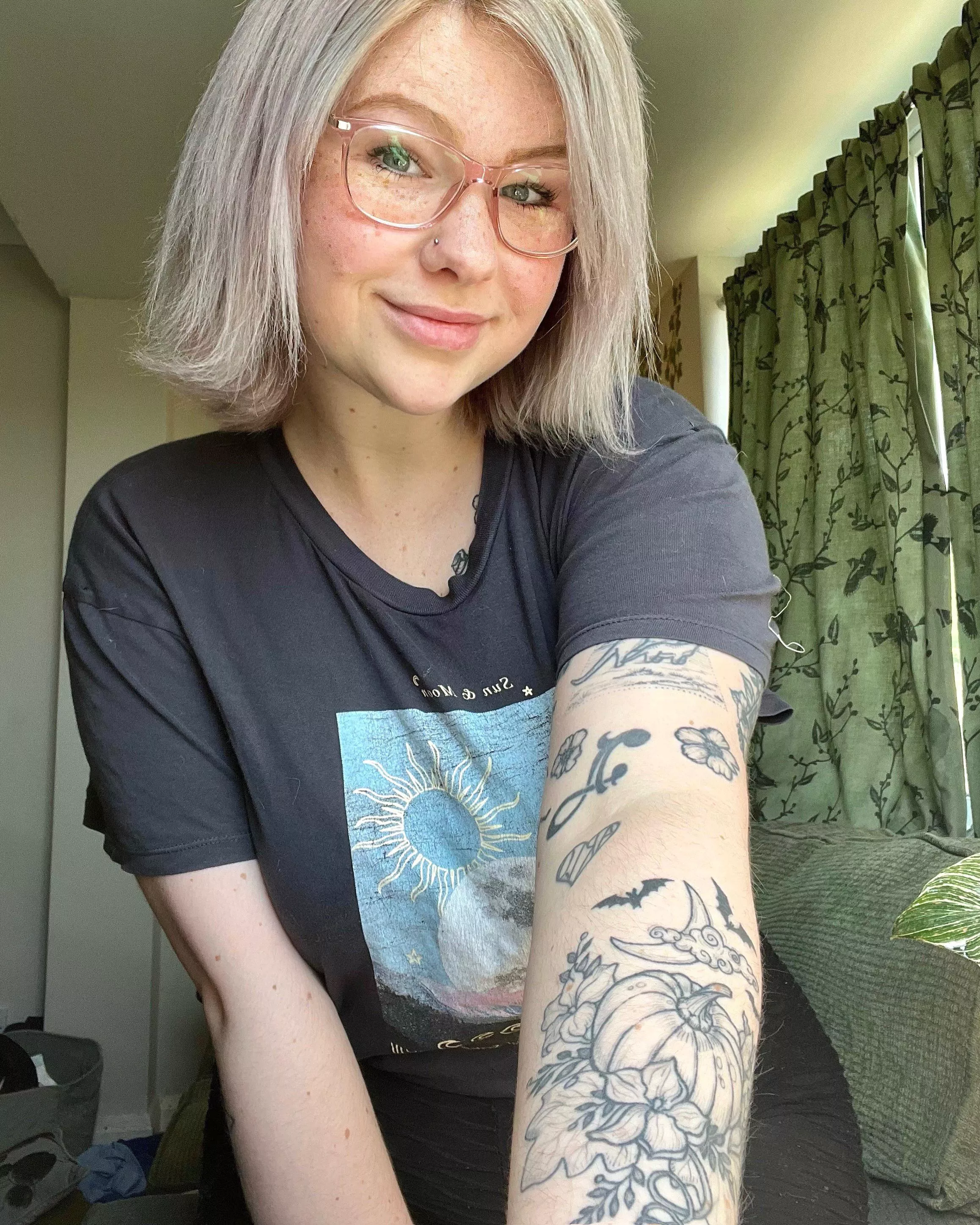 Do you like my tattoos and my new glasses?