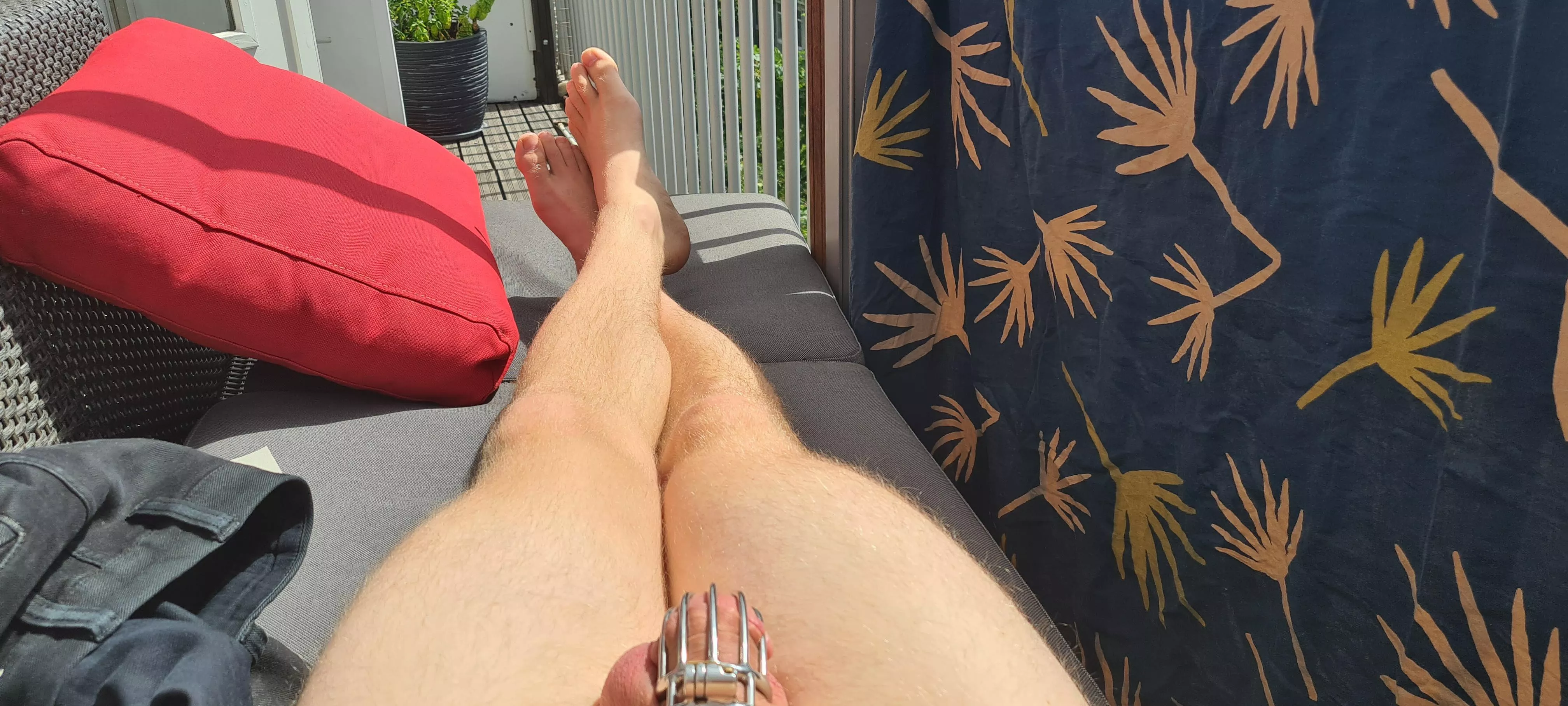 Enjoying the sun with only the cage on