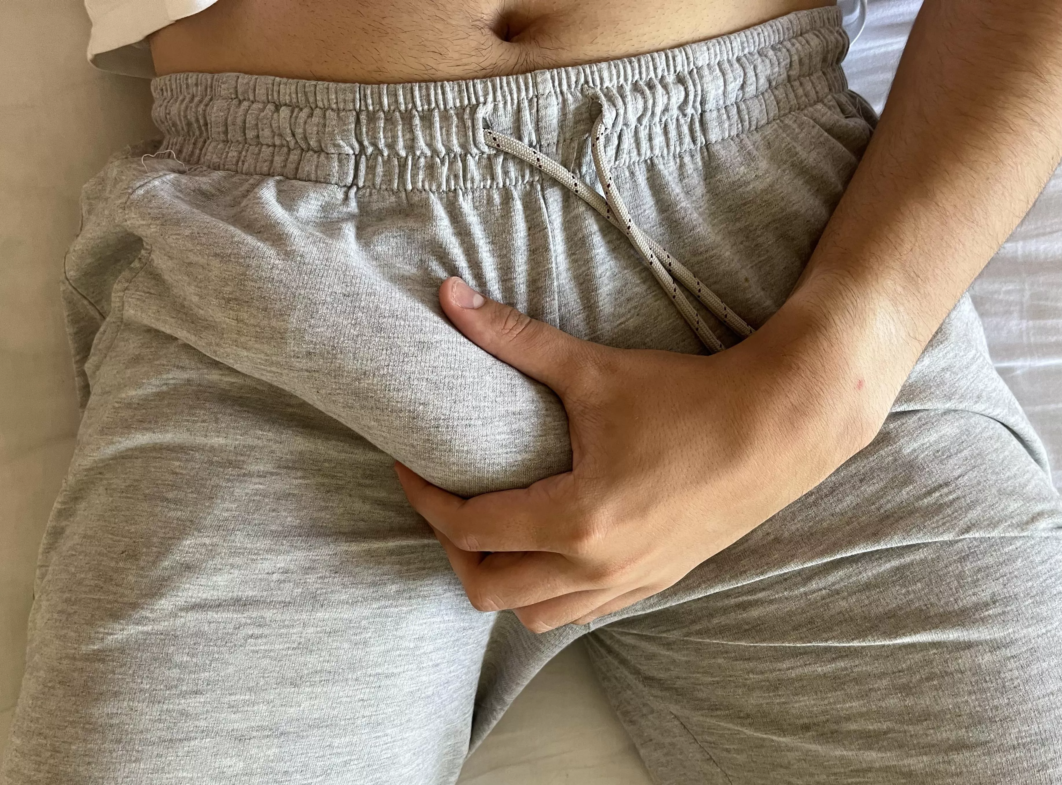 fat cock outline on grey sweatpants