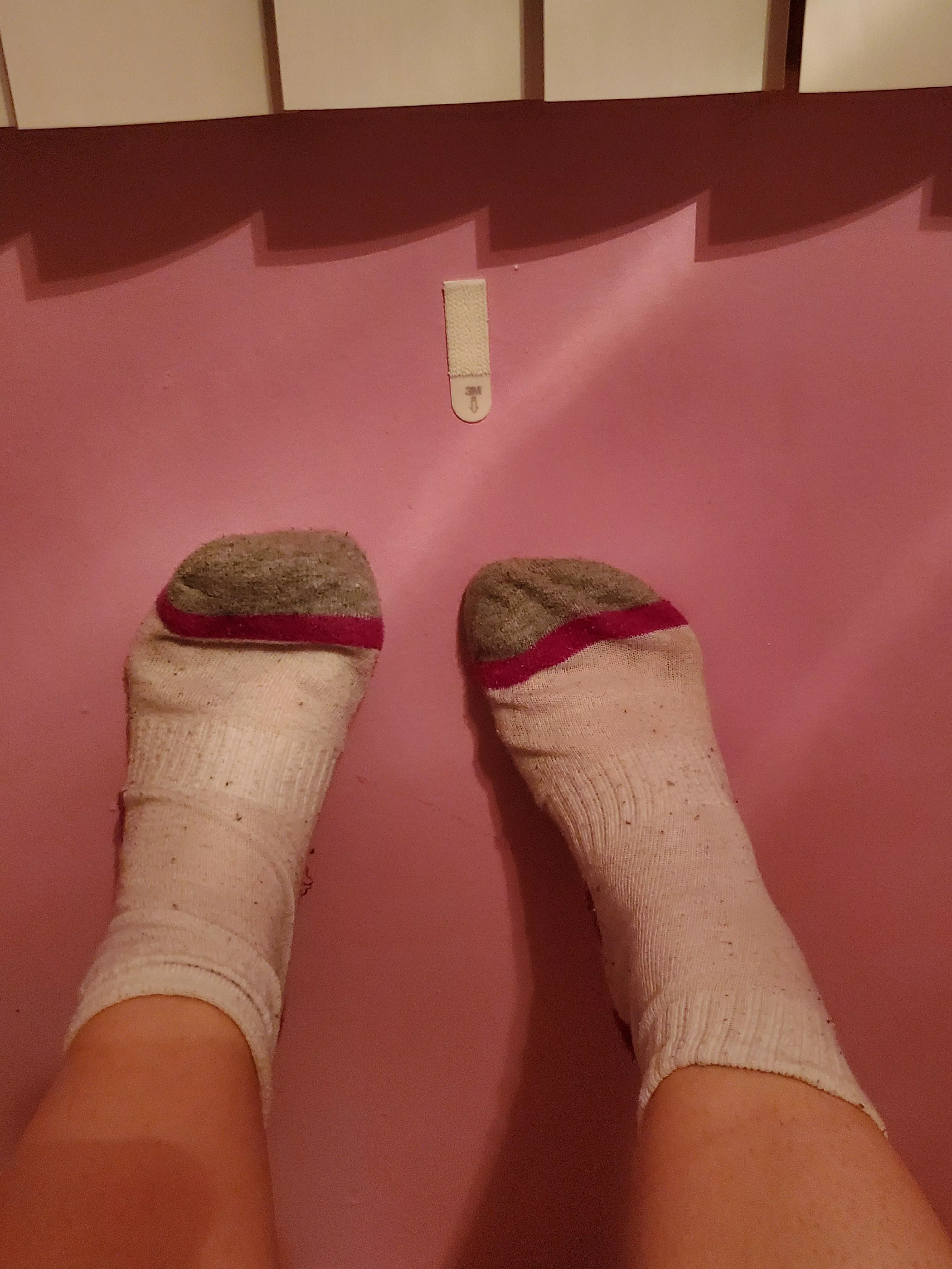 [female] oversized socks and tired feet from a long day