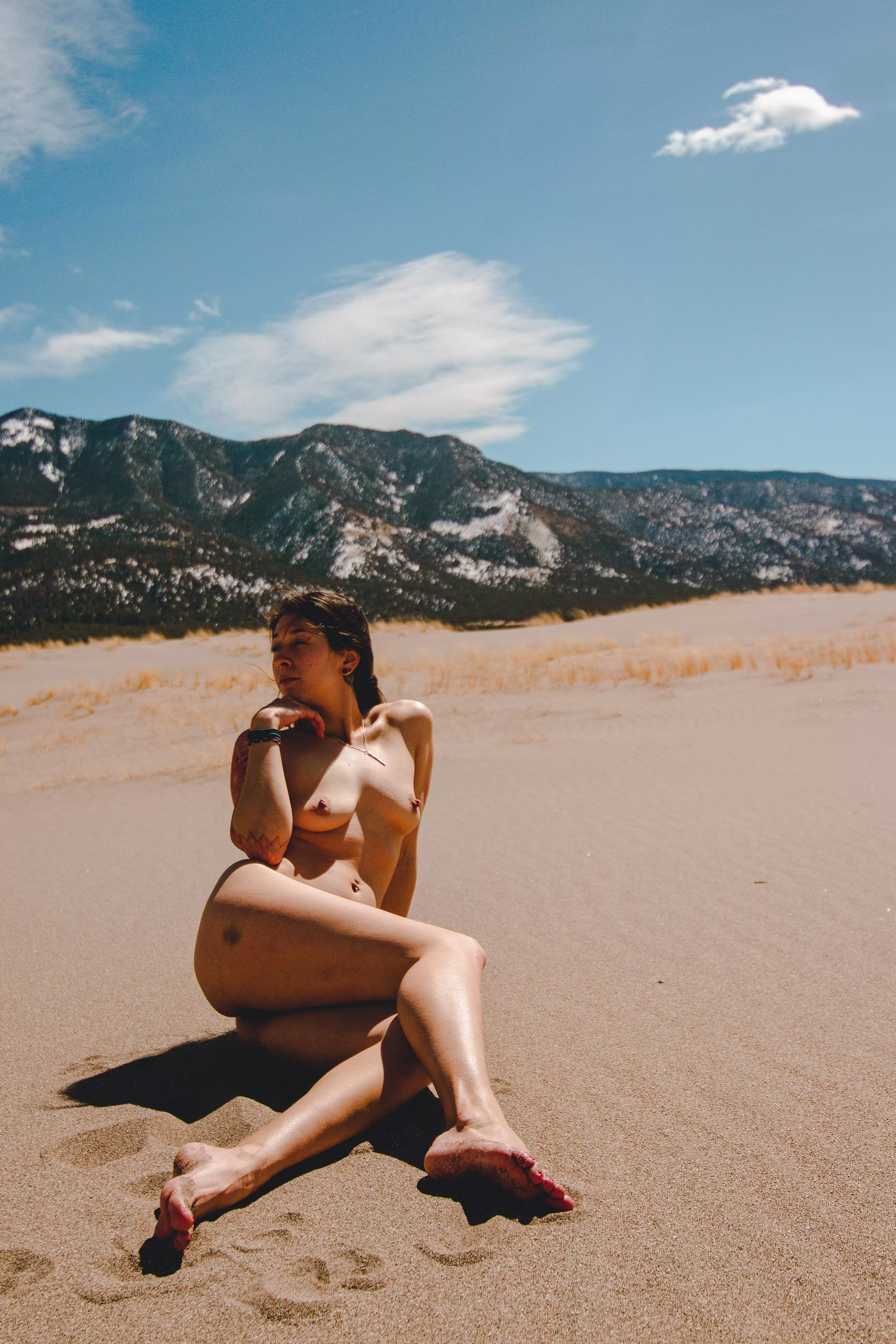 Figure drawing lesson in the sand.