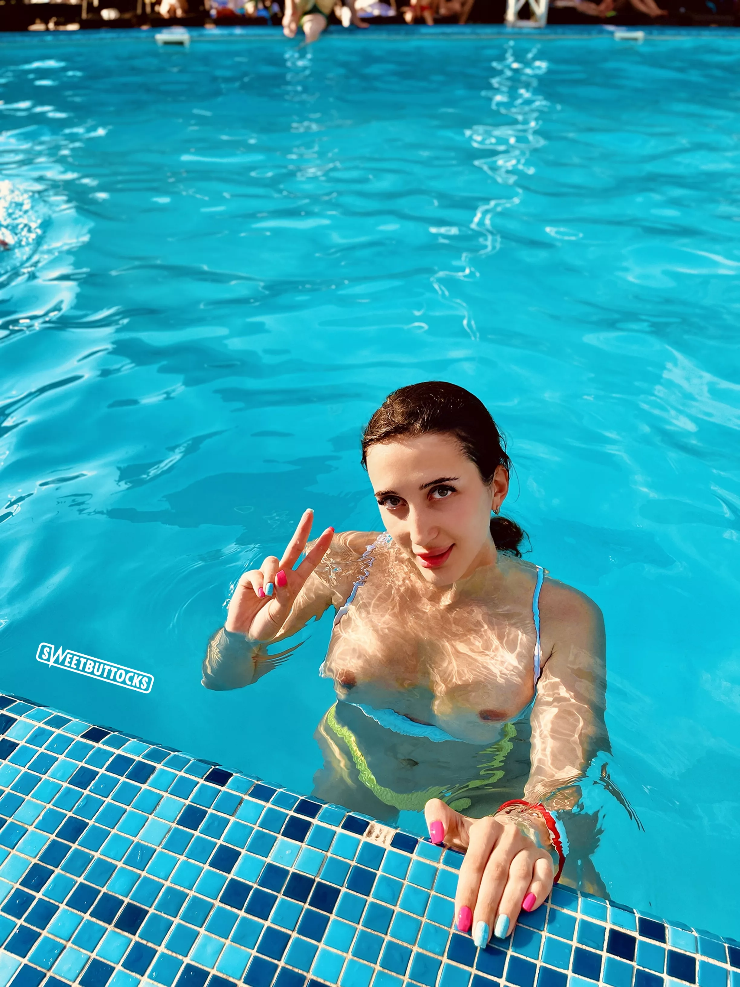 Flashing my tits at the public pool!