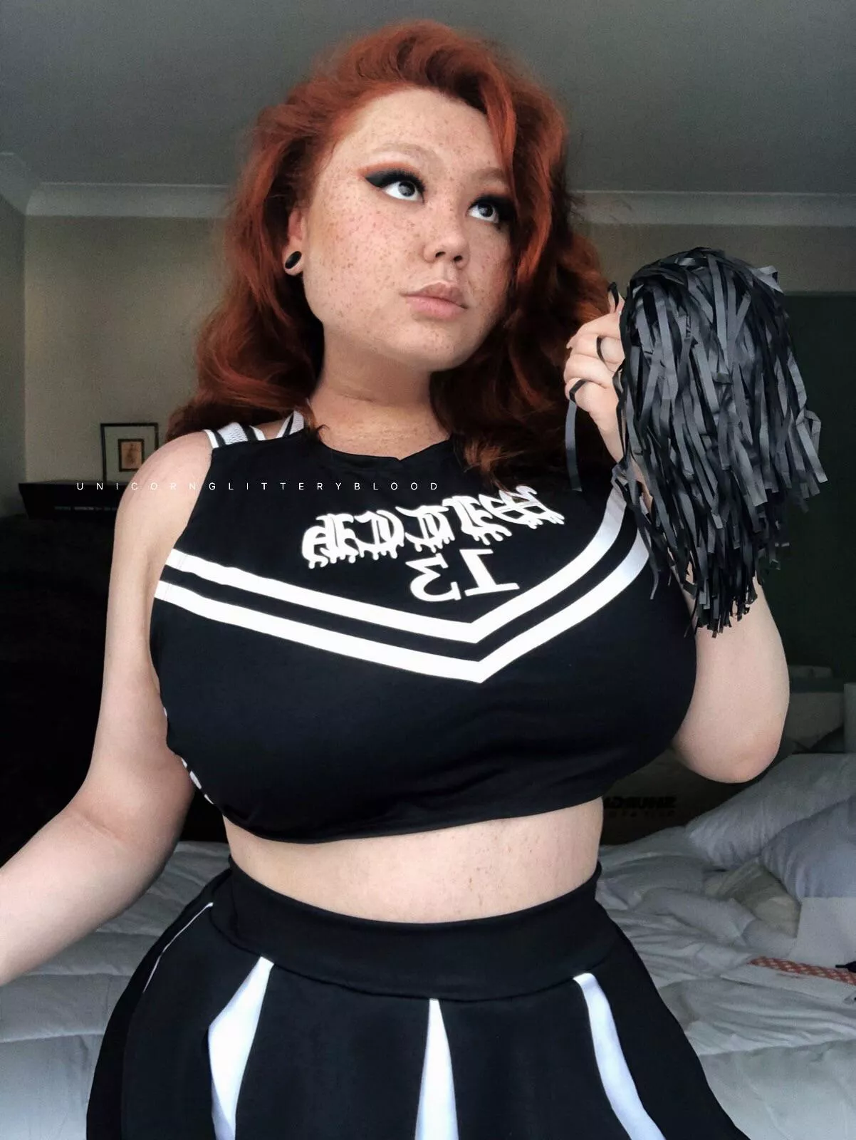 Gothic cheerleader here to make your dick rise!