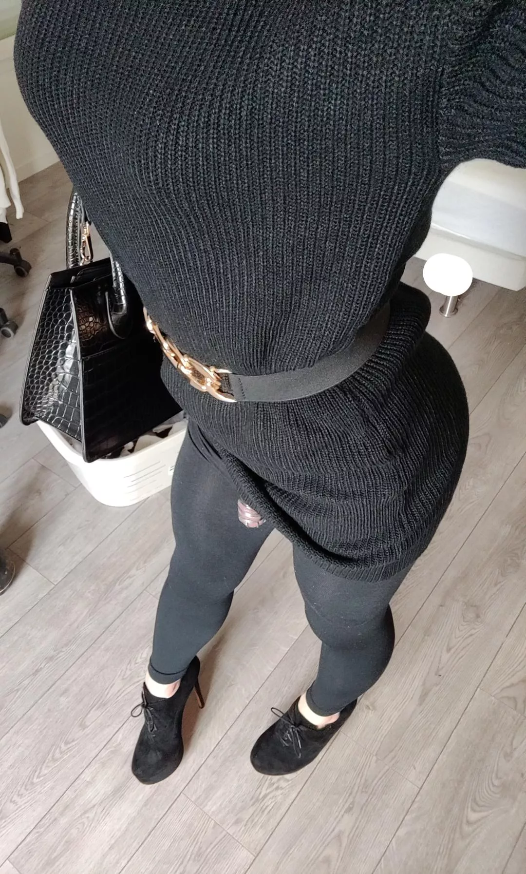 Hand bag. Sweater dress. Leggings. High heel platform and a metal cage 😊 Who is down to go out with me 🤭 Maybe shopping or buying 📚 I'm rather a smart sissy 🤓