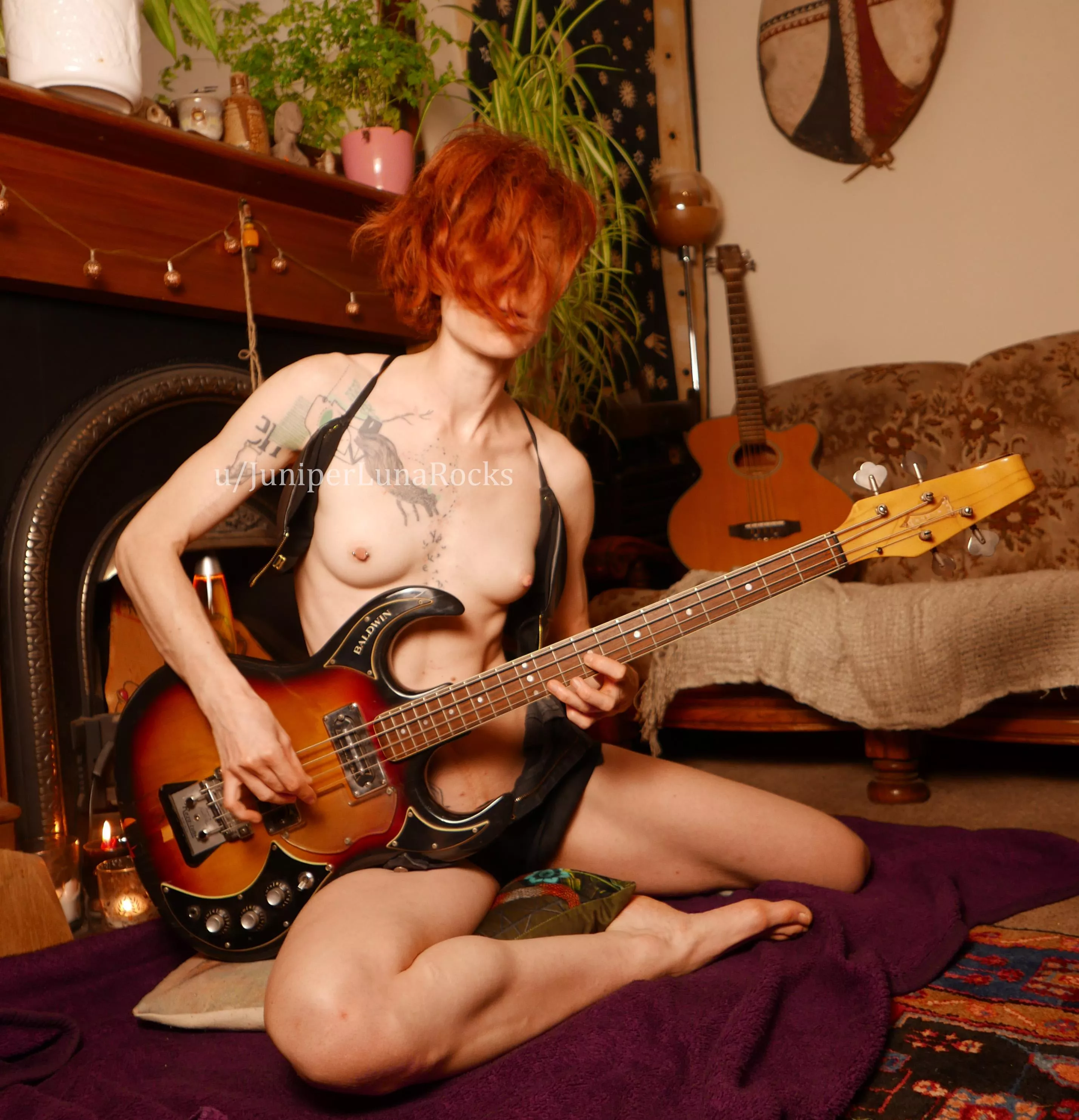 Hot female bassist with tattoos