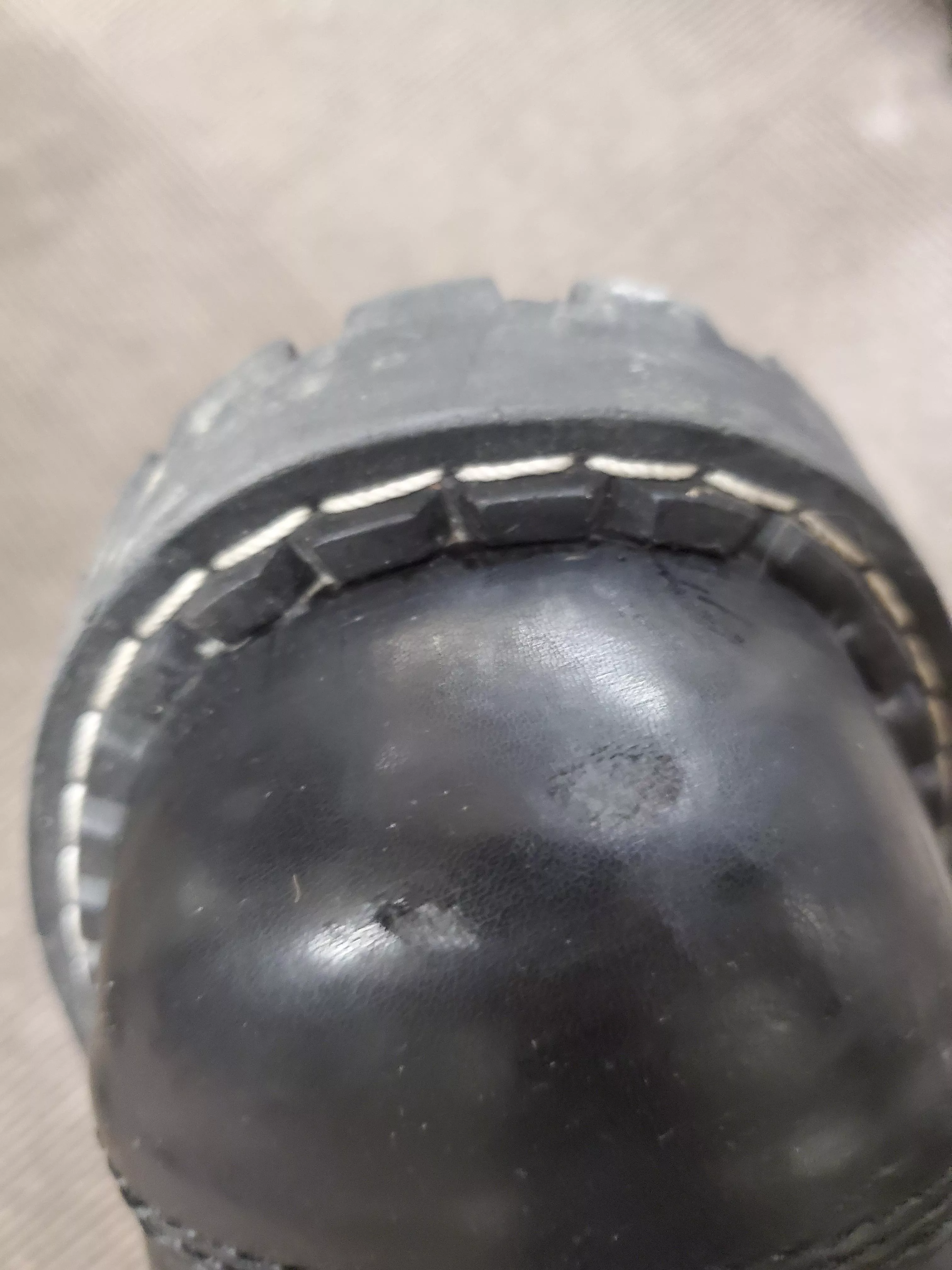 how do I care for a small hole in my boots?