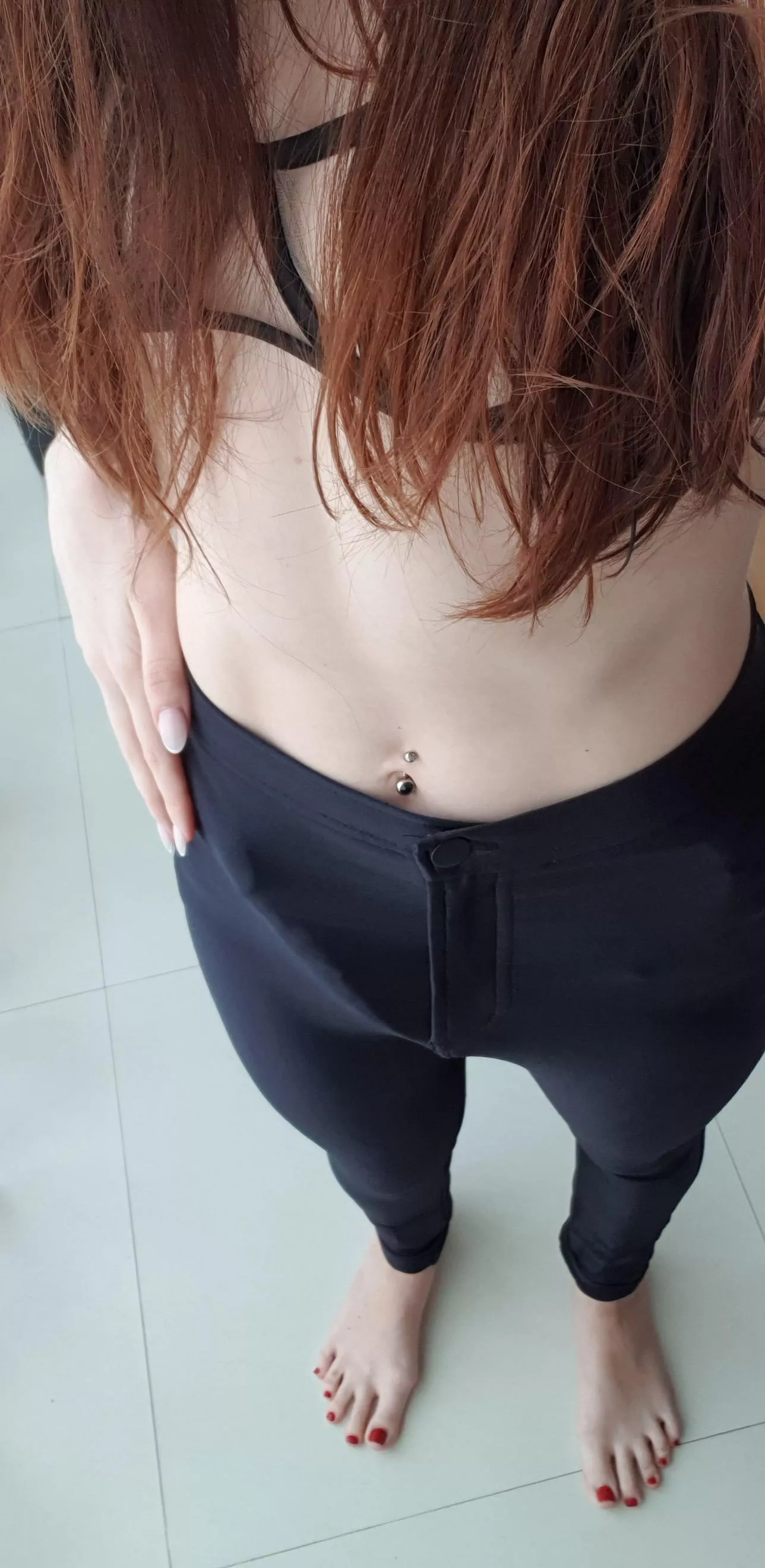 How much precum would drip out of your little clitty if you looked down and noticed what I was hiding under my tight pants?