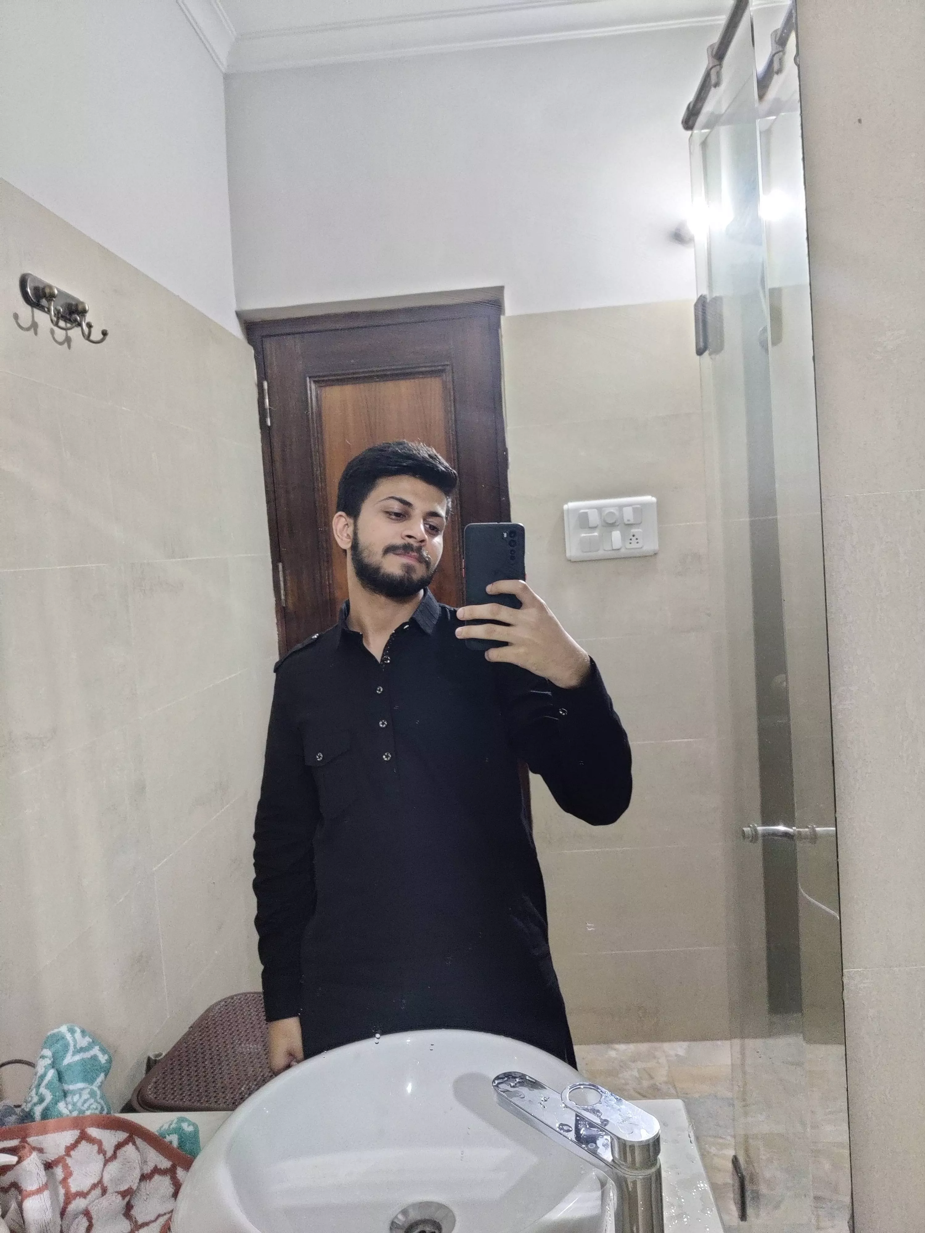 I don't see enough brown men here. Here's me in a kurta hiding in the bathroom at a party.