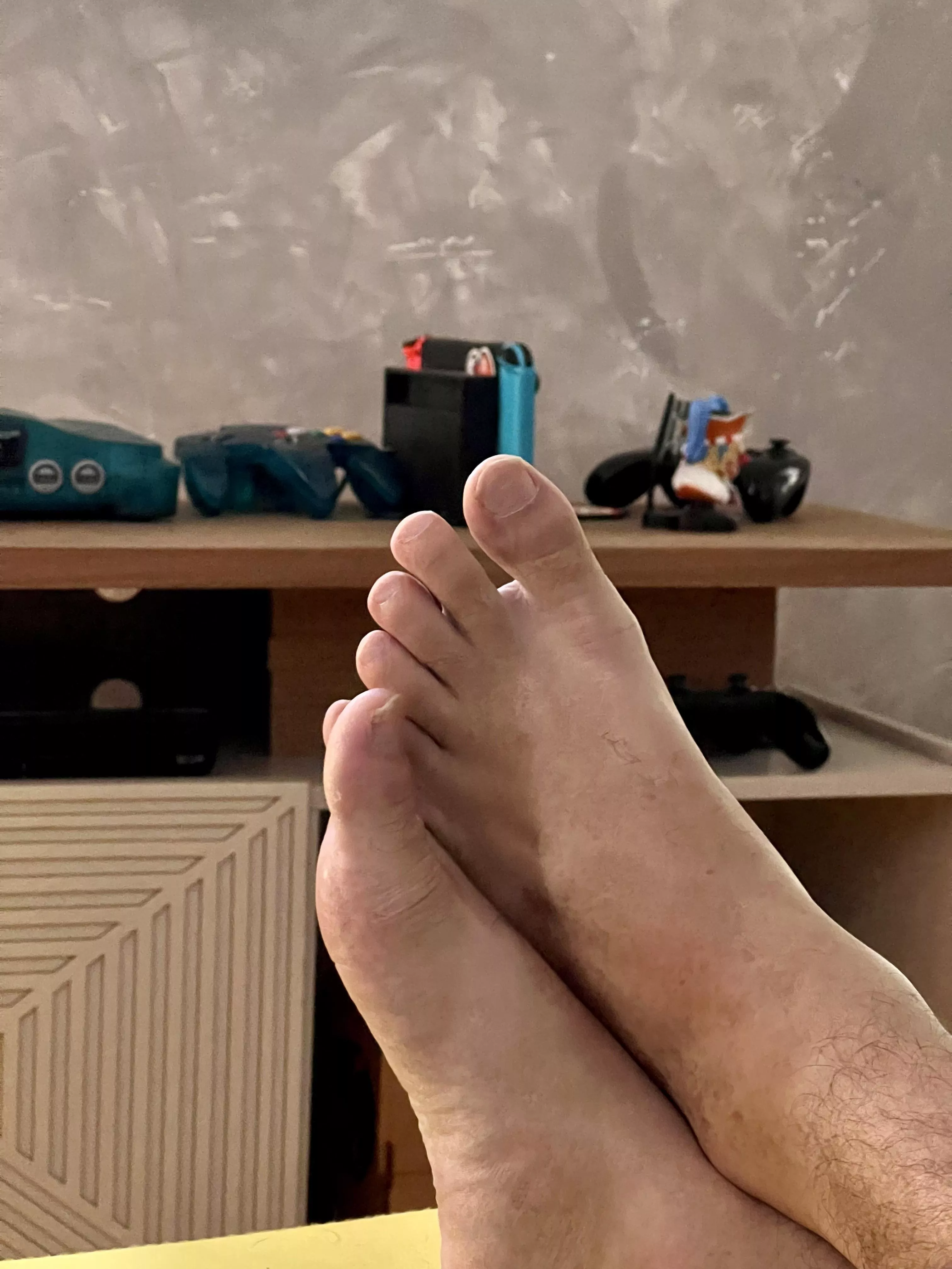 I recently noticed that my brother’s feet are really cute. What you guys think of it? Should I post more of him? He’d kill me if he realizes what I’m doing