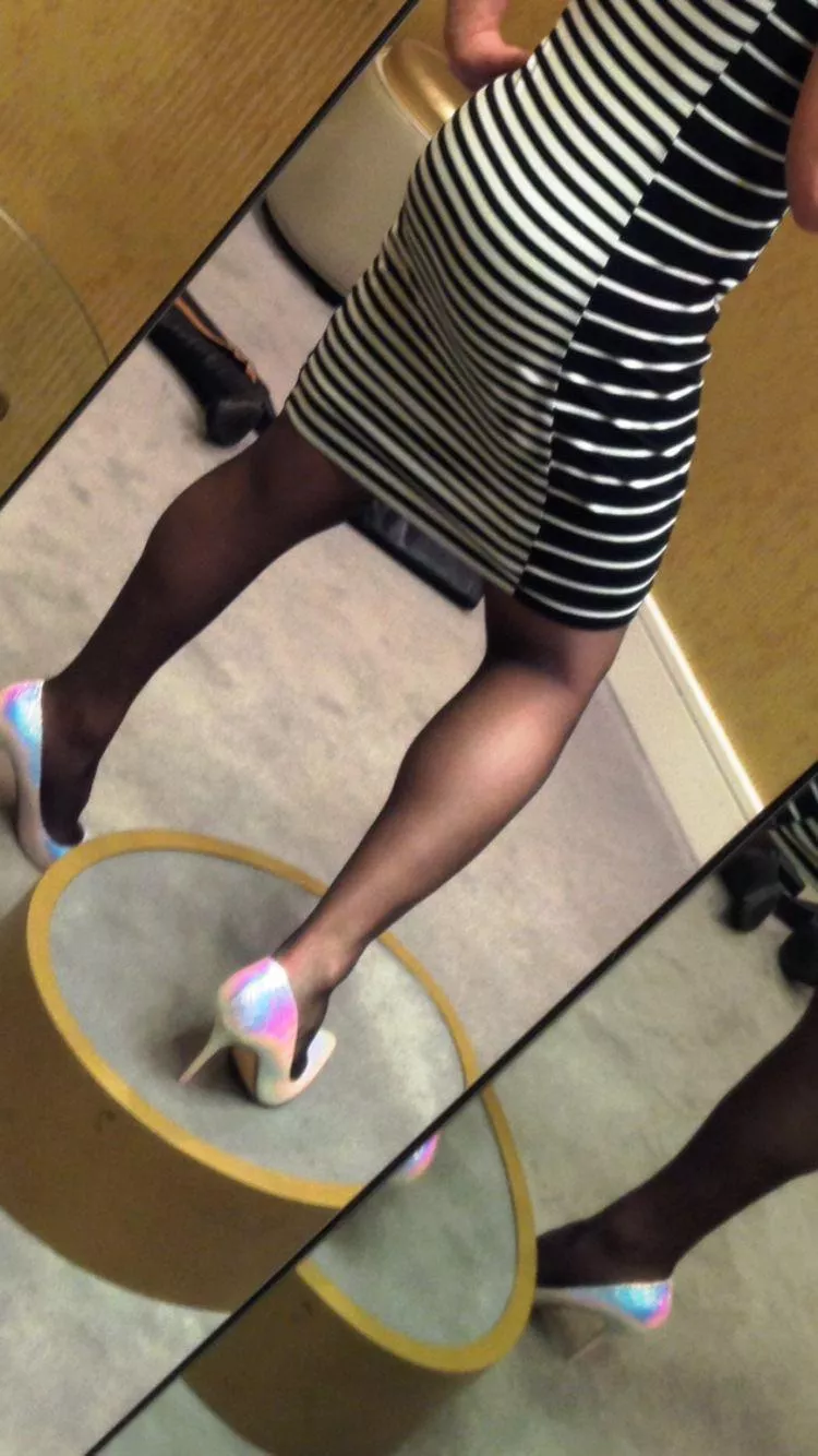 In a Nordstrom dressing room with iridescent heels.