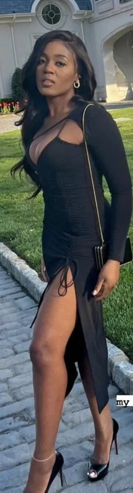 Kemi (BB21) in a black dress