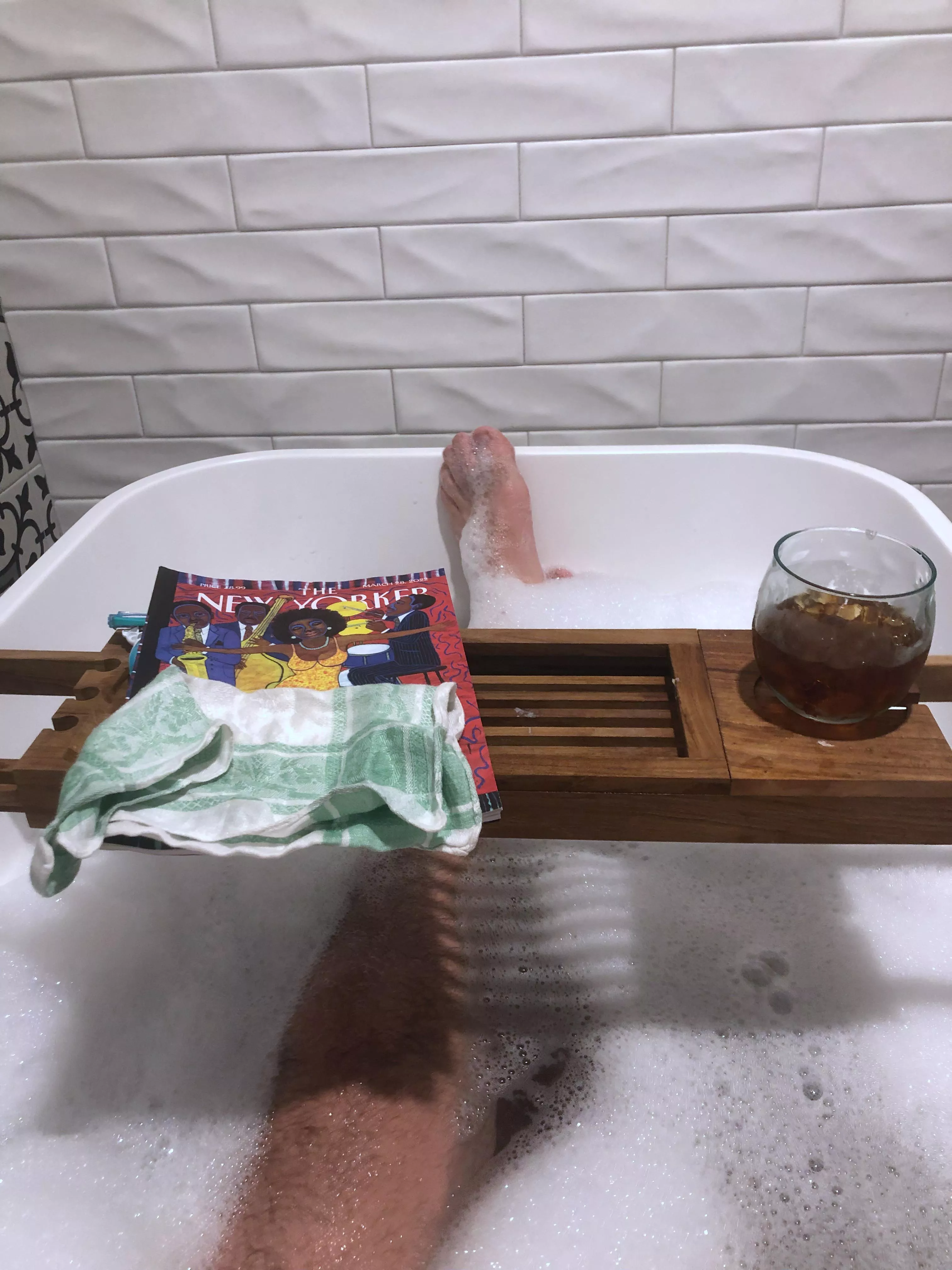 Late night soak with a cocktail and New Yorker to read.