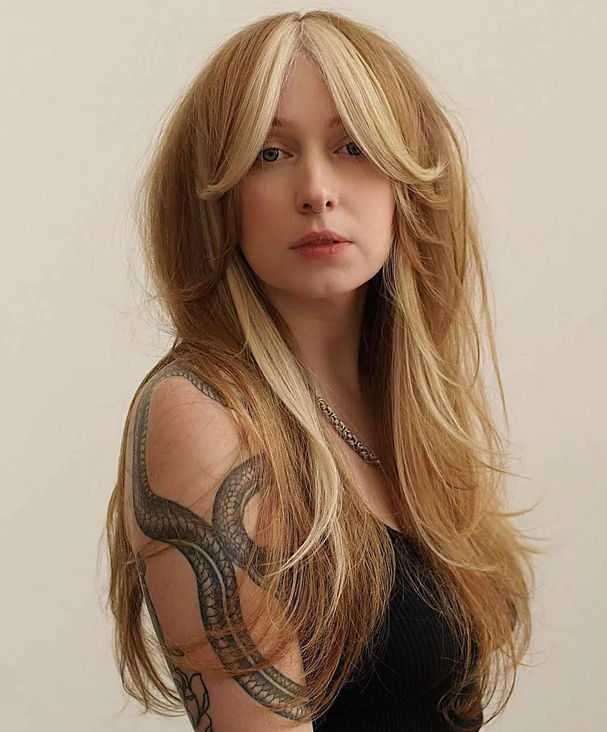 Long haired tattooed alt blonde