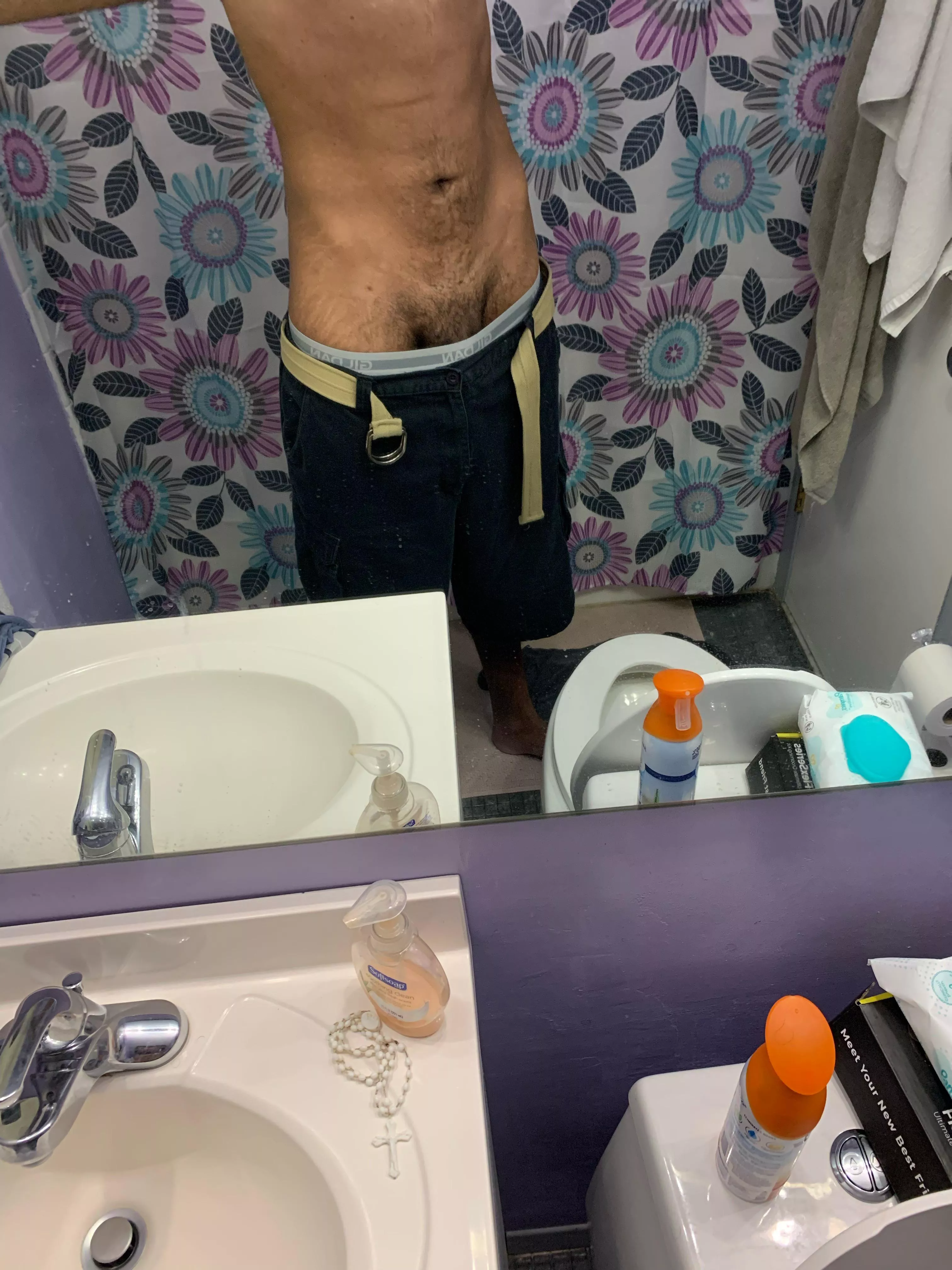 [m]23 (6â€™7) taking a shower after playing a game of basketball