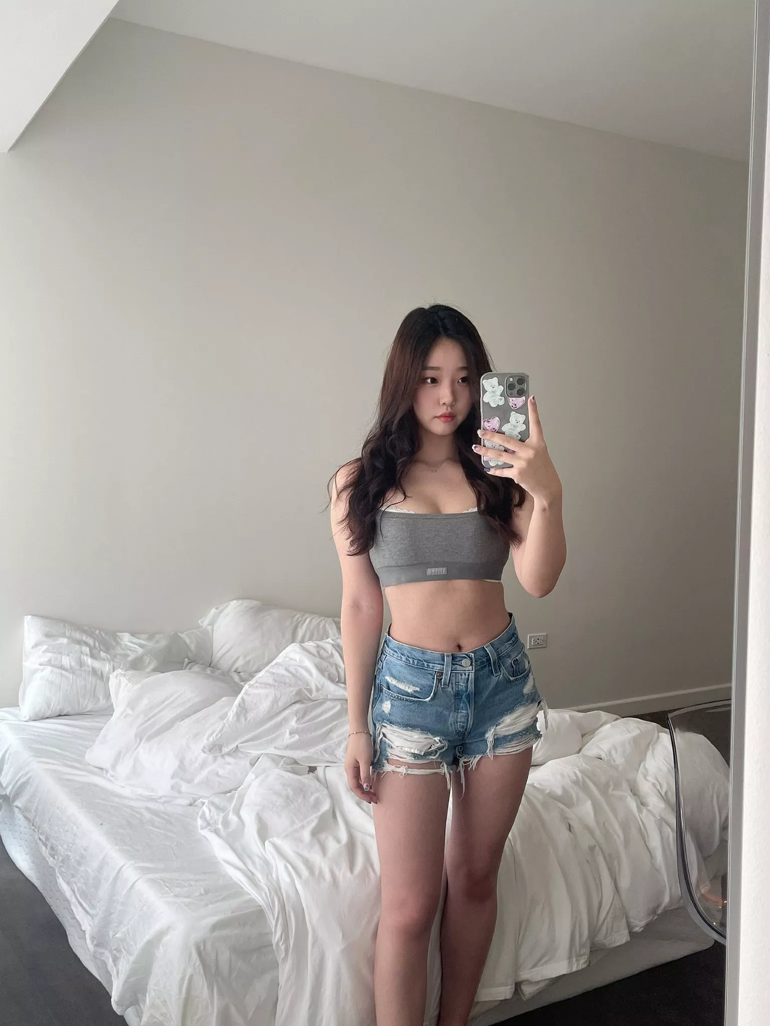 midriff and denim shorts