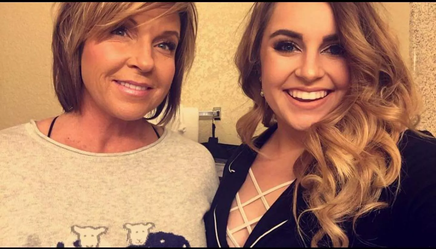 mom and daughter cheesin'